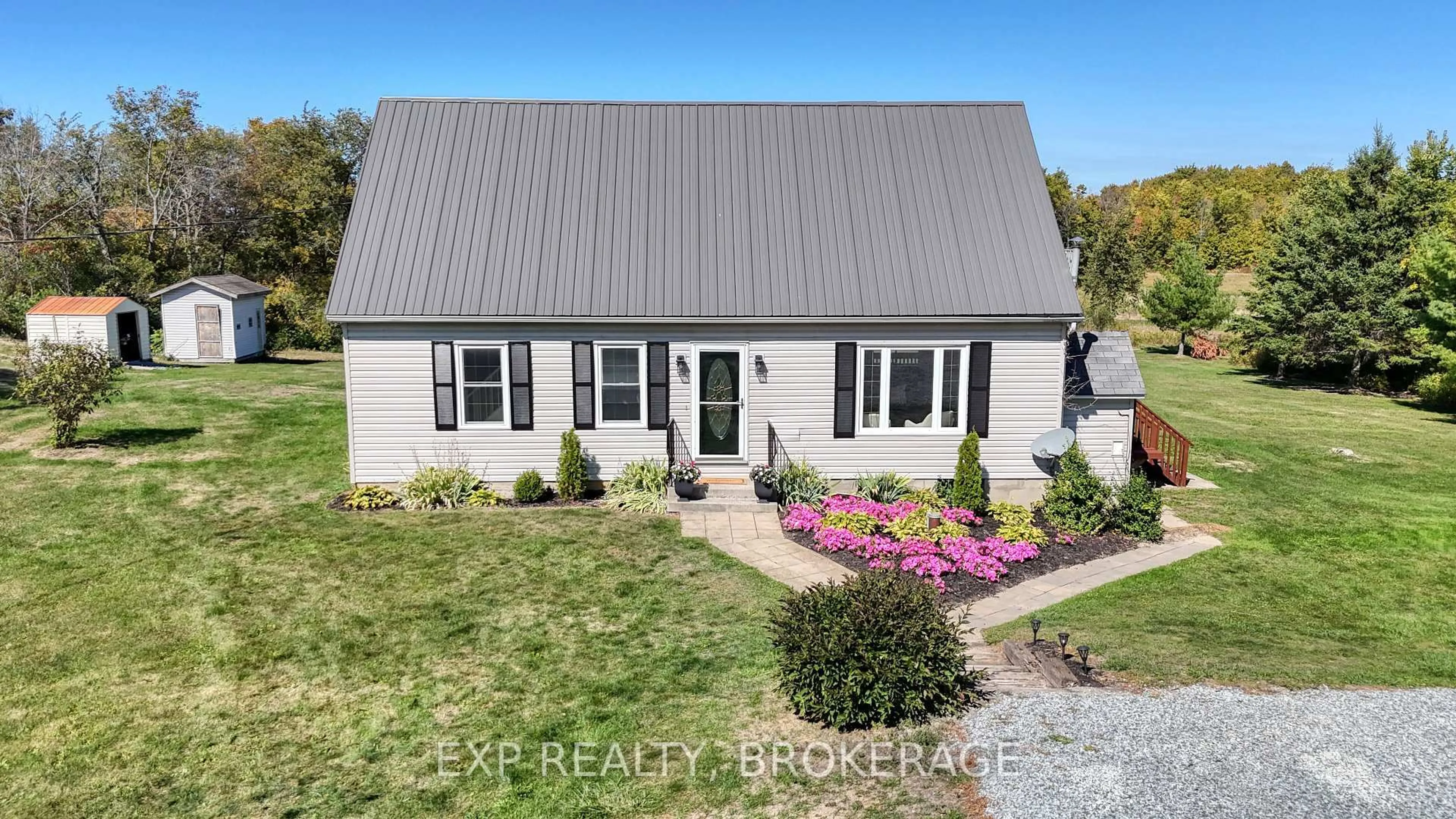 Home with vinyl exterior material, street for 64 BERRY Rd, Front of Leeds & Seeleys Bay Ontario K7G 2V3