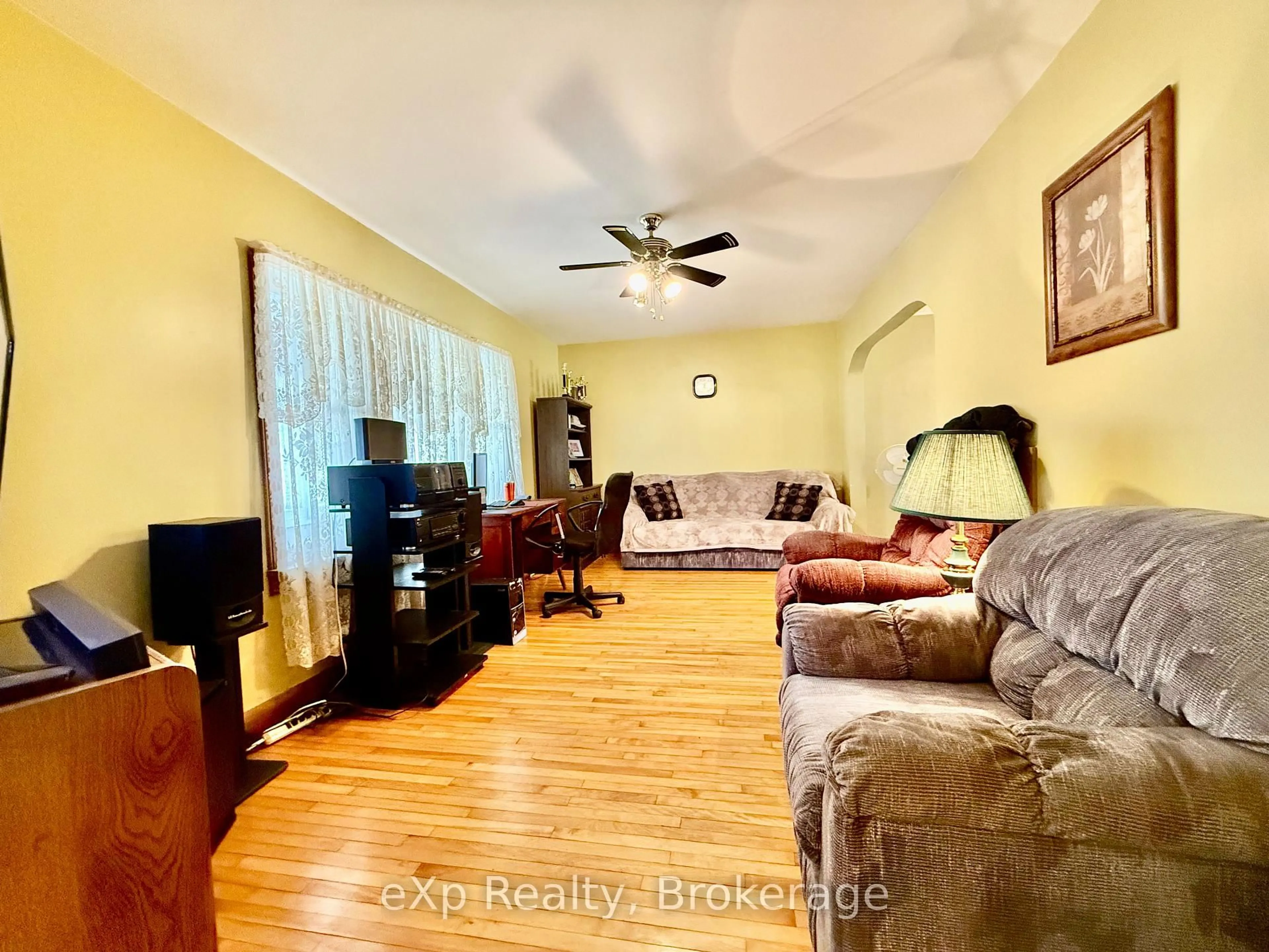 Living room with furniture, wood/laminate floor for 2 Simpson St, South Bruce Ontario N0G 2J0