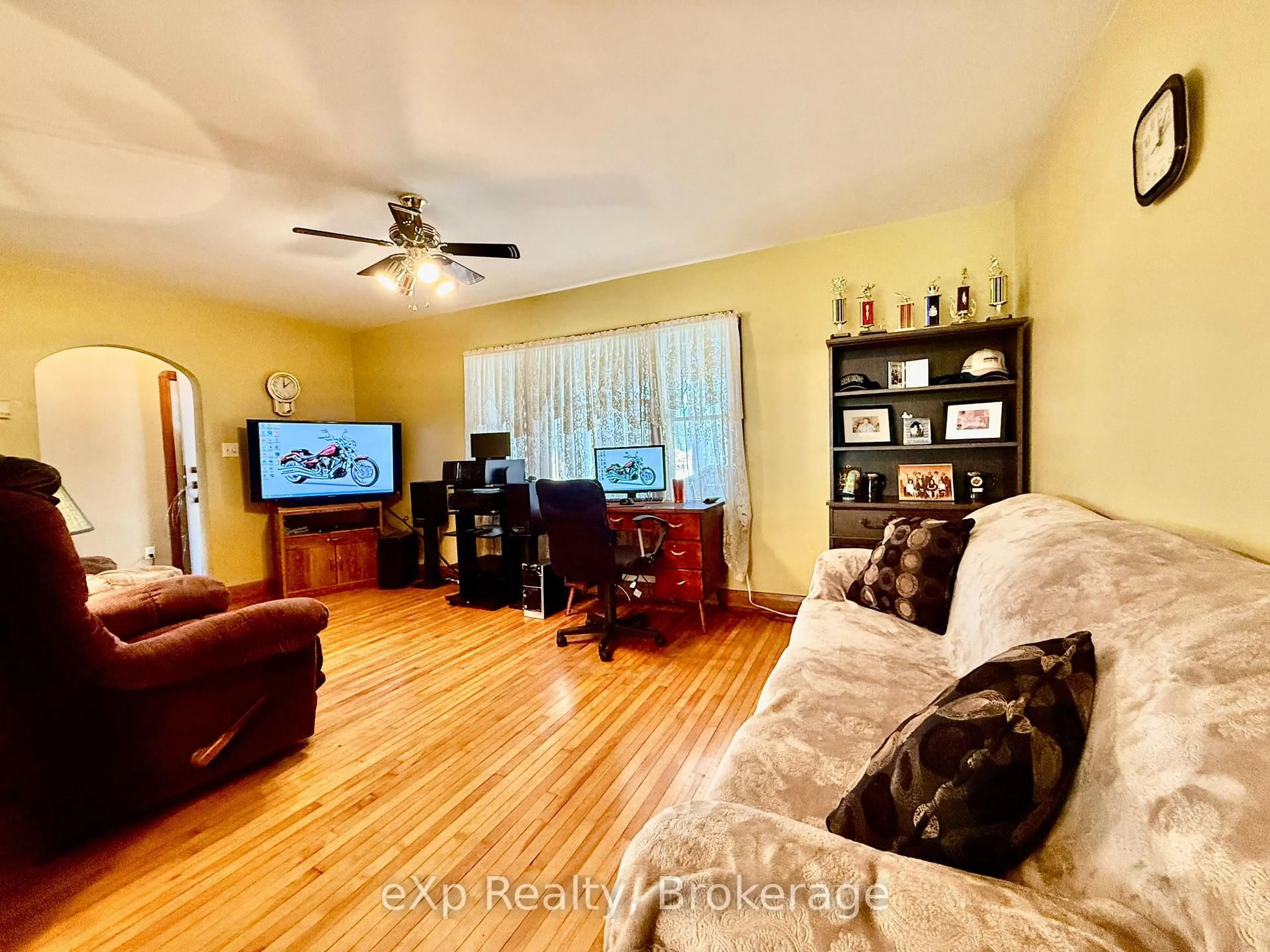 Living room with furniture, wood/laminate floor for 2 Simpson St, South Bruce Ontario N0G 2J0