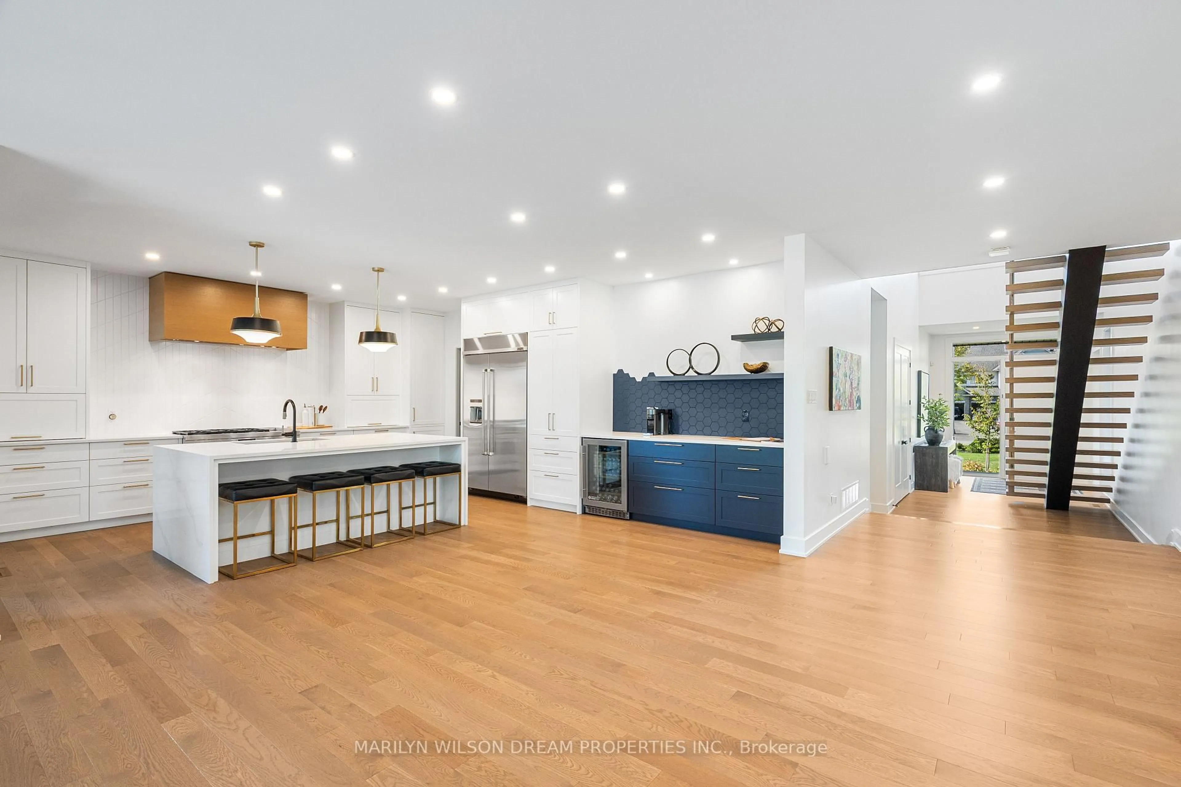 Open concept kitchen, wood/laminate floor for 521 Leimerk Crt, Ottawa Ontario K4M 0E8
