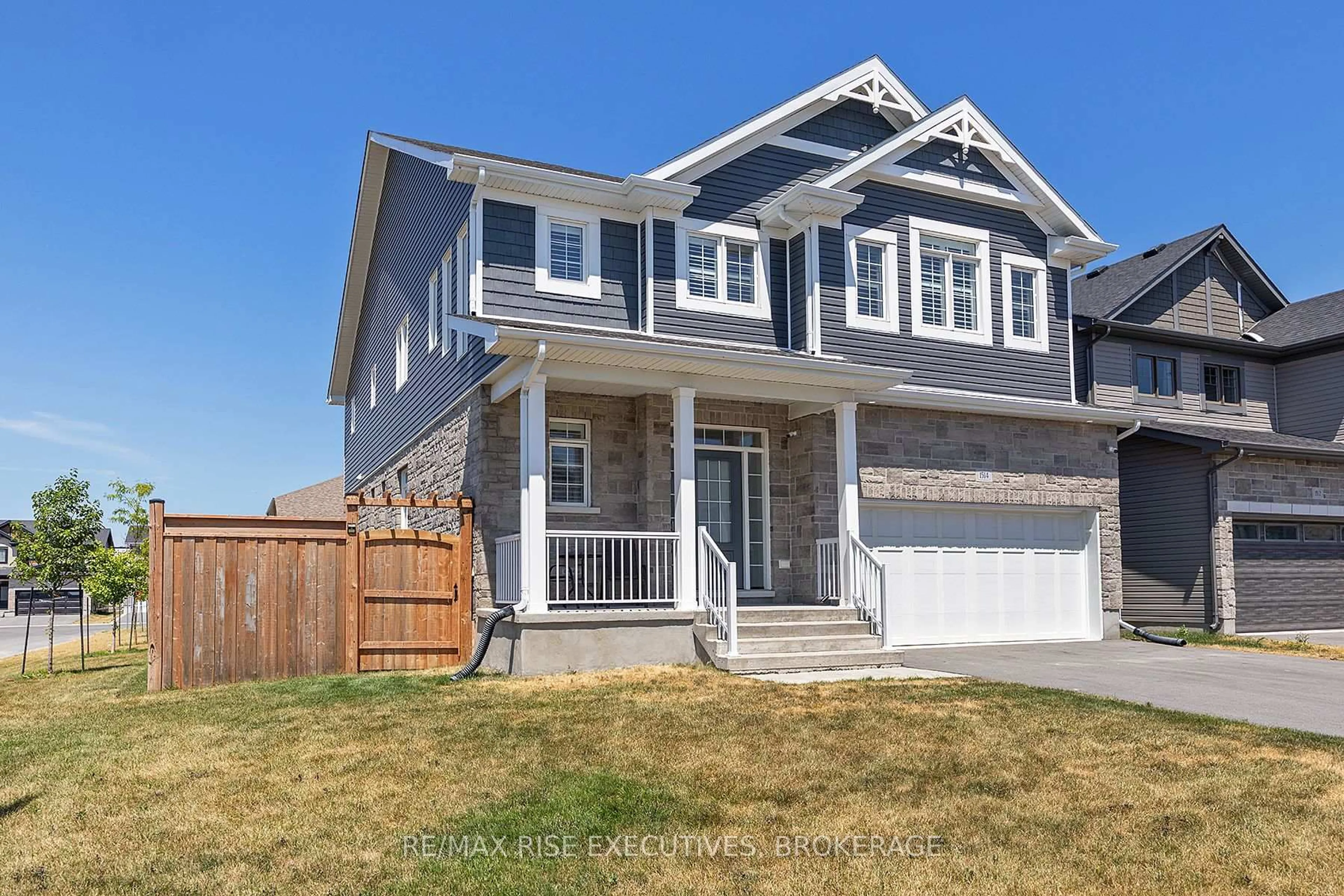 Home with vinyl exterior material, street for 1514 Shira Dr, Kingston Ontario K7P 0S3