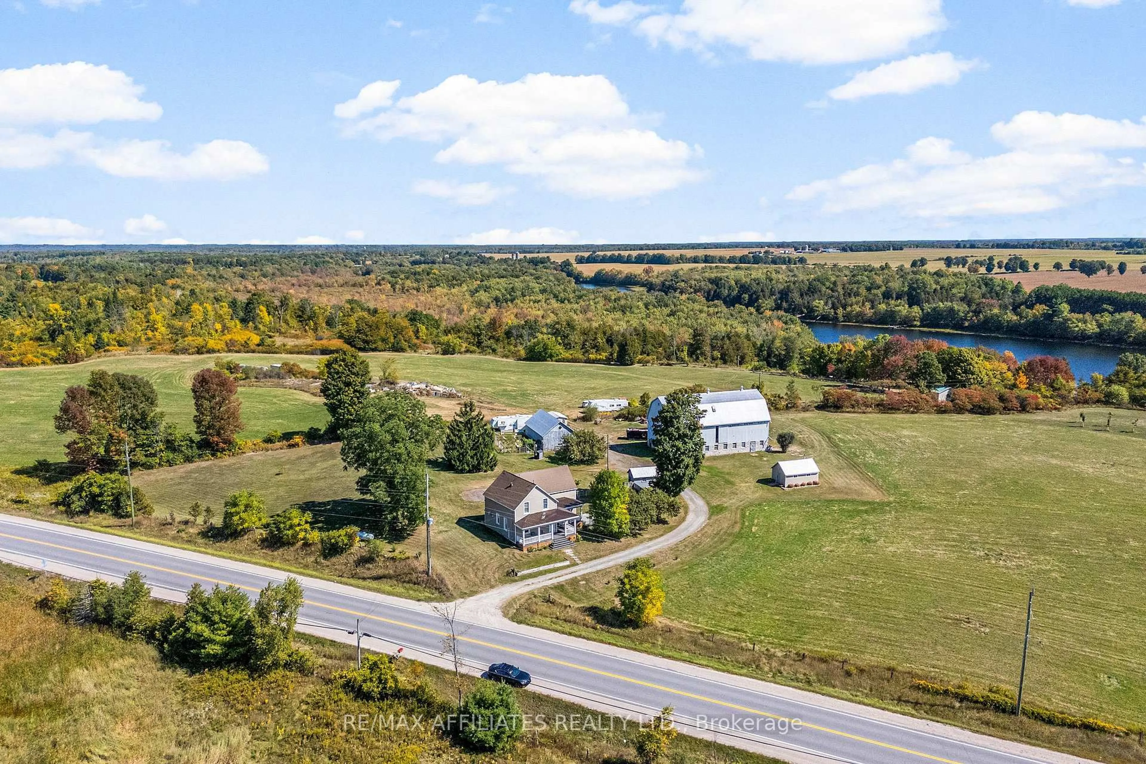 A pic from outside/outdoor area/front of a property/back of a property/a pic from drone, water/lake/river/ocean view for 2442 Hwy 511 Highway, Lanark Ontario K0G 1K0