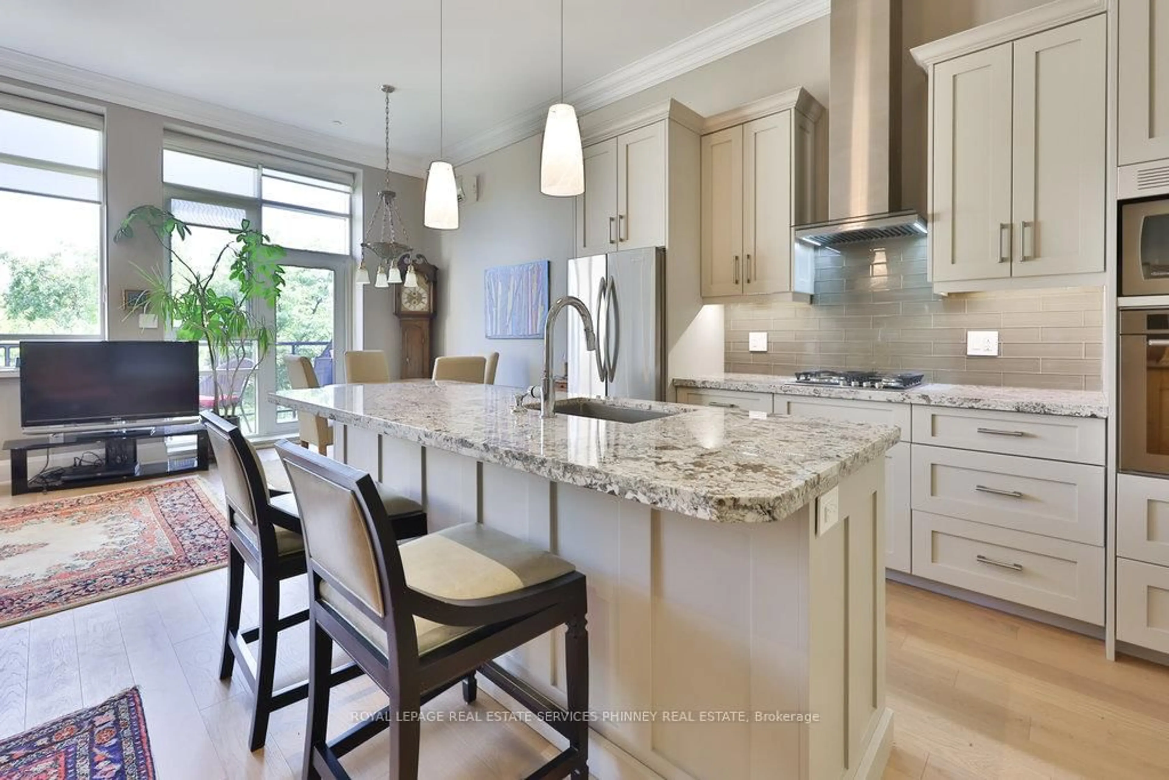 Open concept kitchen, ceramic/tile floor for 397 King St #204, Hamilton Ontario L9H 1W9