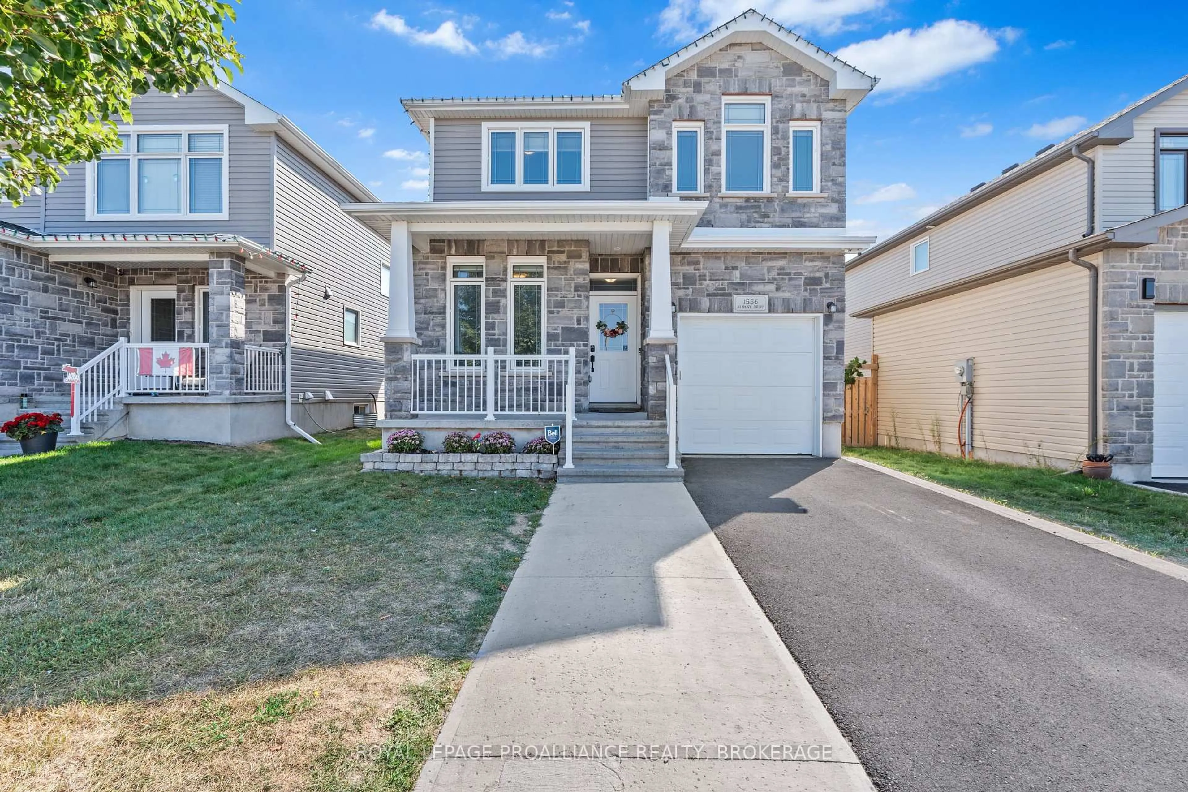 Home with vinyl exterior material, street for 1556 Albany Dr, Kingston Ontario K7P 0L9