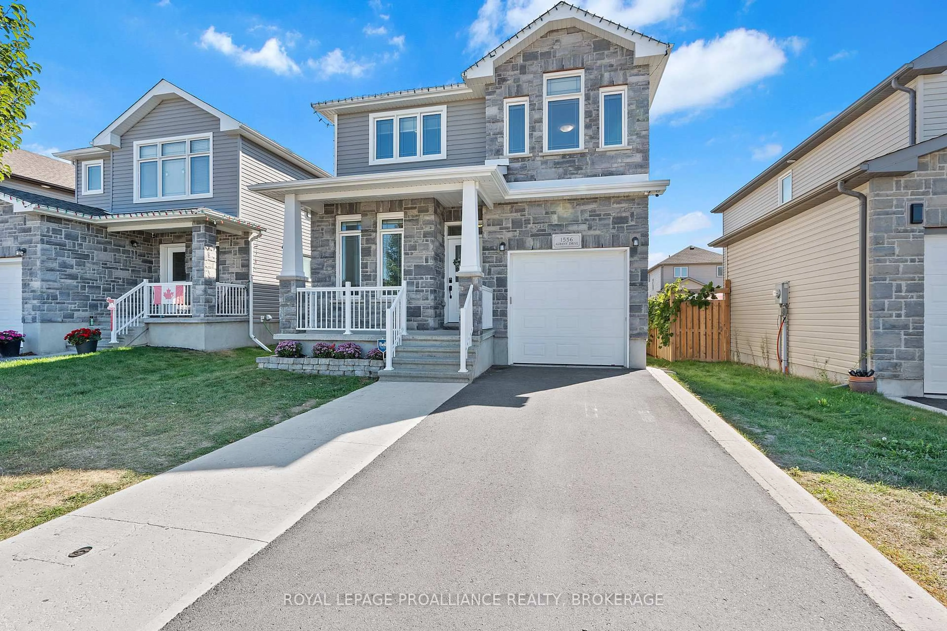 Home with vinyl exterior material, street for 1556 Albany Dr, Kingston Ontario K7P 0L9