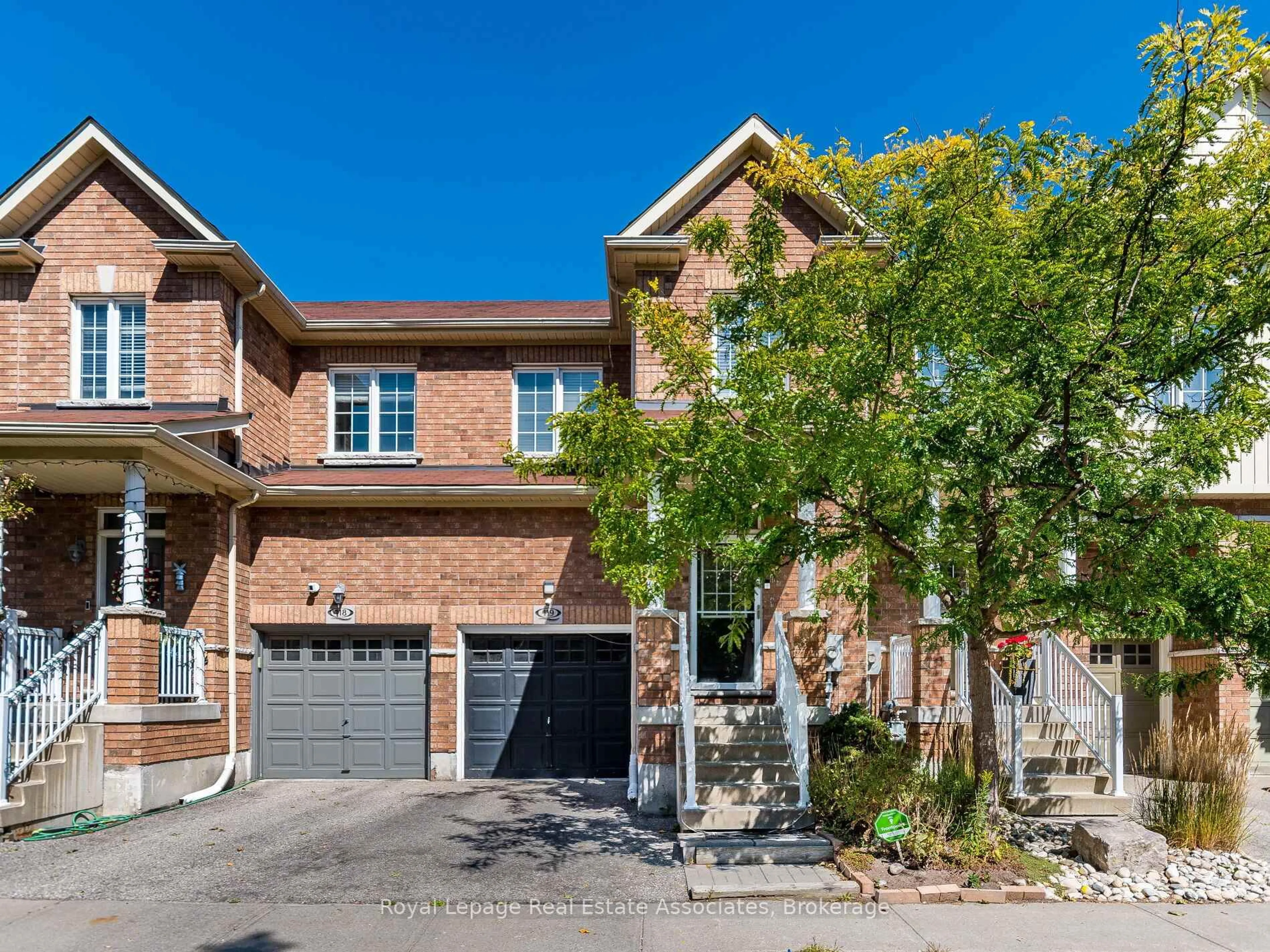 Home with brick exterior material, street for 110 Highland Rd #119, Kitchener Ontario N2M 3S1
