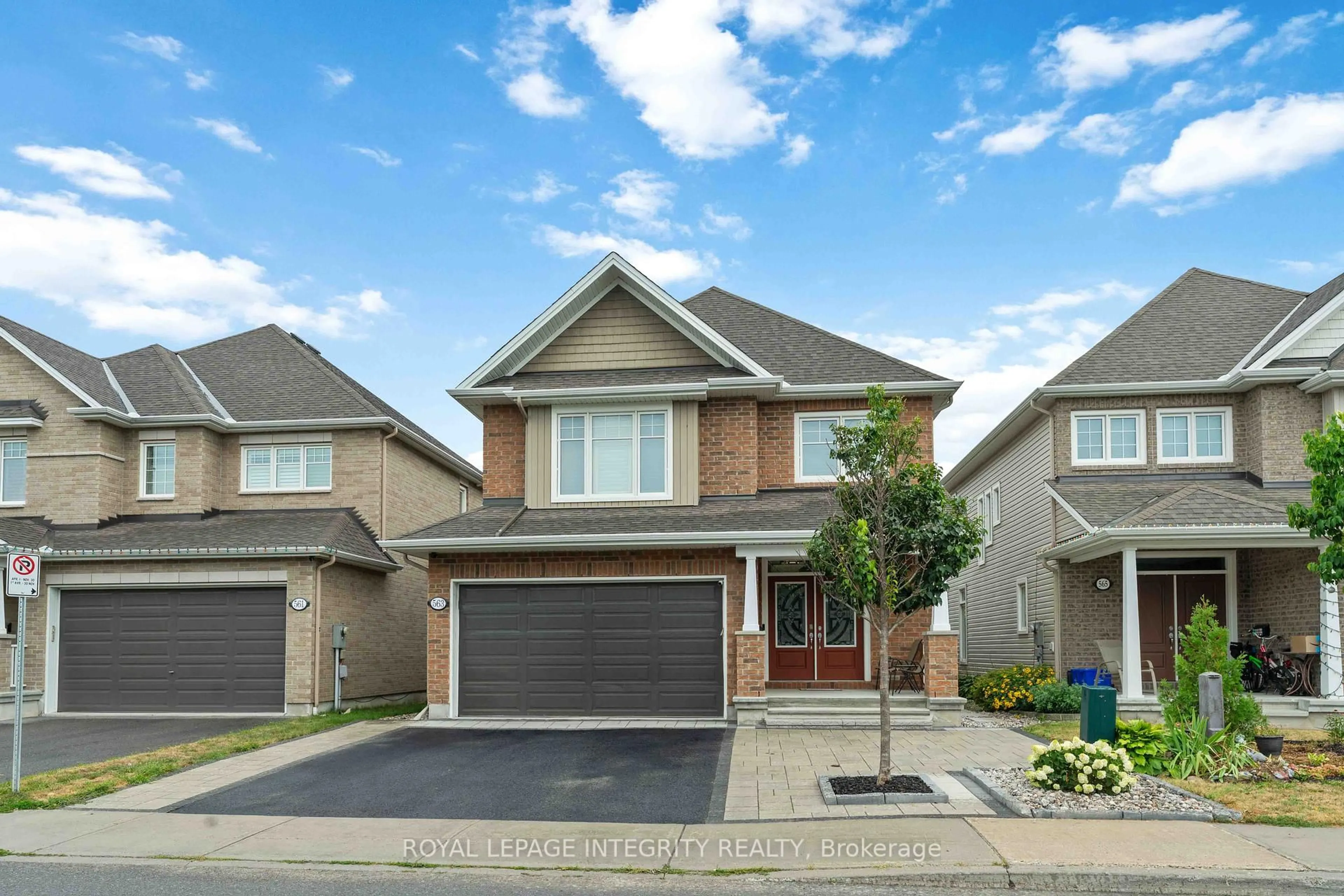Home with brick exterior material, street for 563 Egret Way, Ottawa Ontario K2J 0E3
