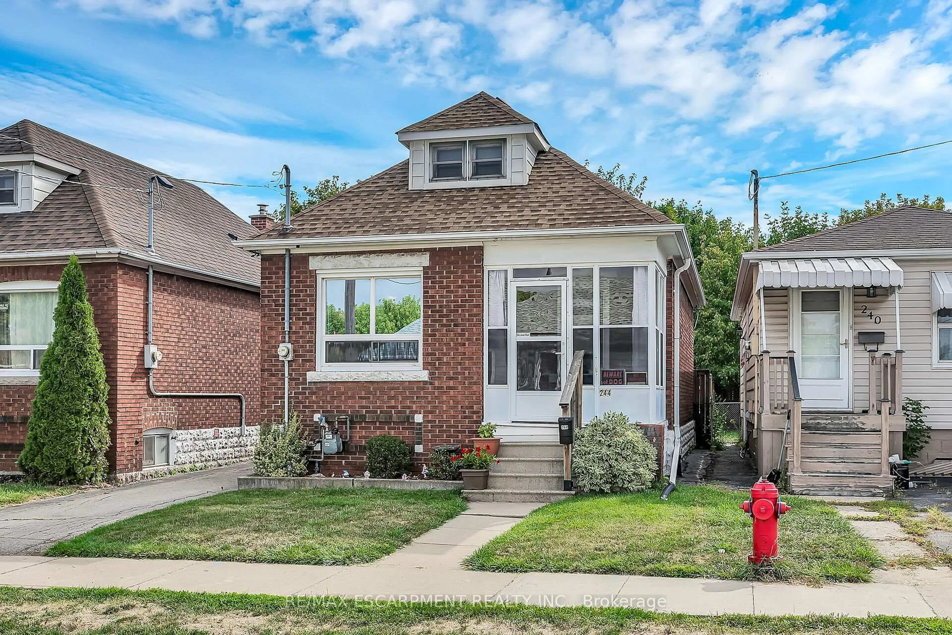 Home with brick exterior material, street for 244 Cope St, Hamilton Ontario L8H 5B5
