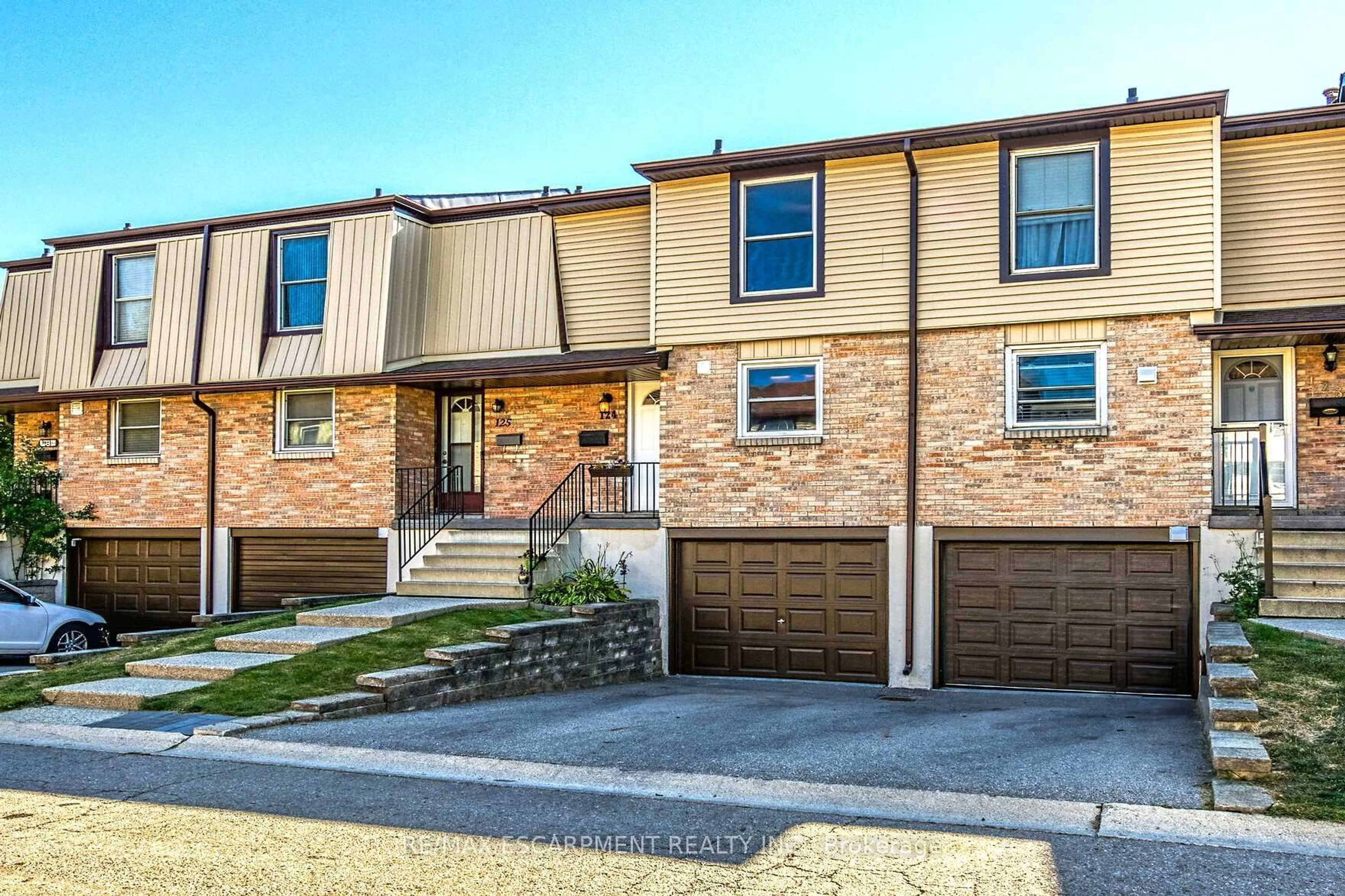 Home with brick exterior material, street for 10 ANGUS Rd #124, Hamilton Ontario L8K 6K3