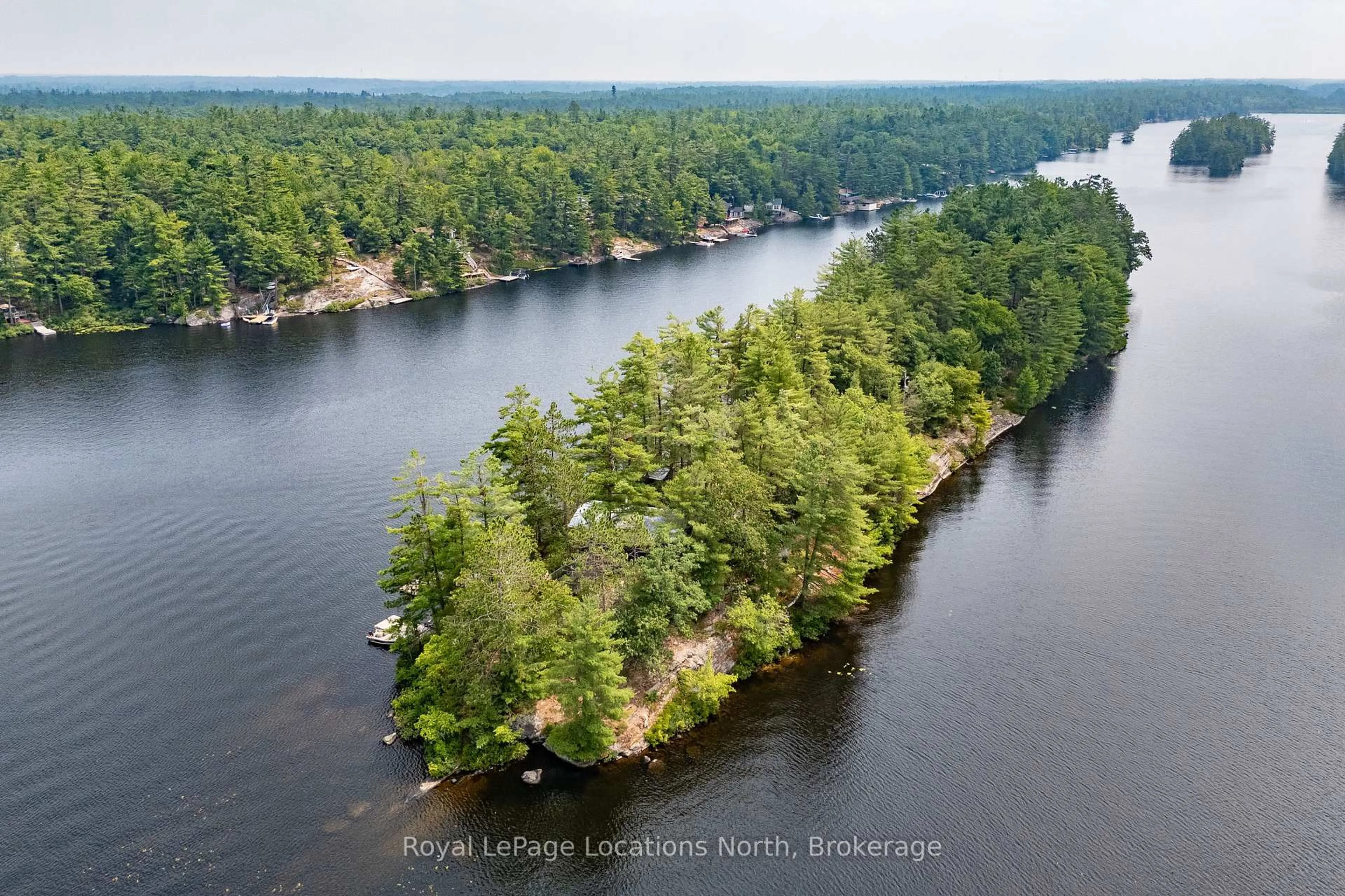 A pic from outside/outdoor area/front of a property/back of a property/a pic from drone, water/lake/river/ocean view for 2 3LN Berkinshaw Island, Gravenhurst Ontario P1P 1R2