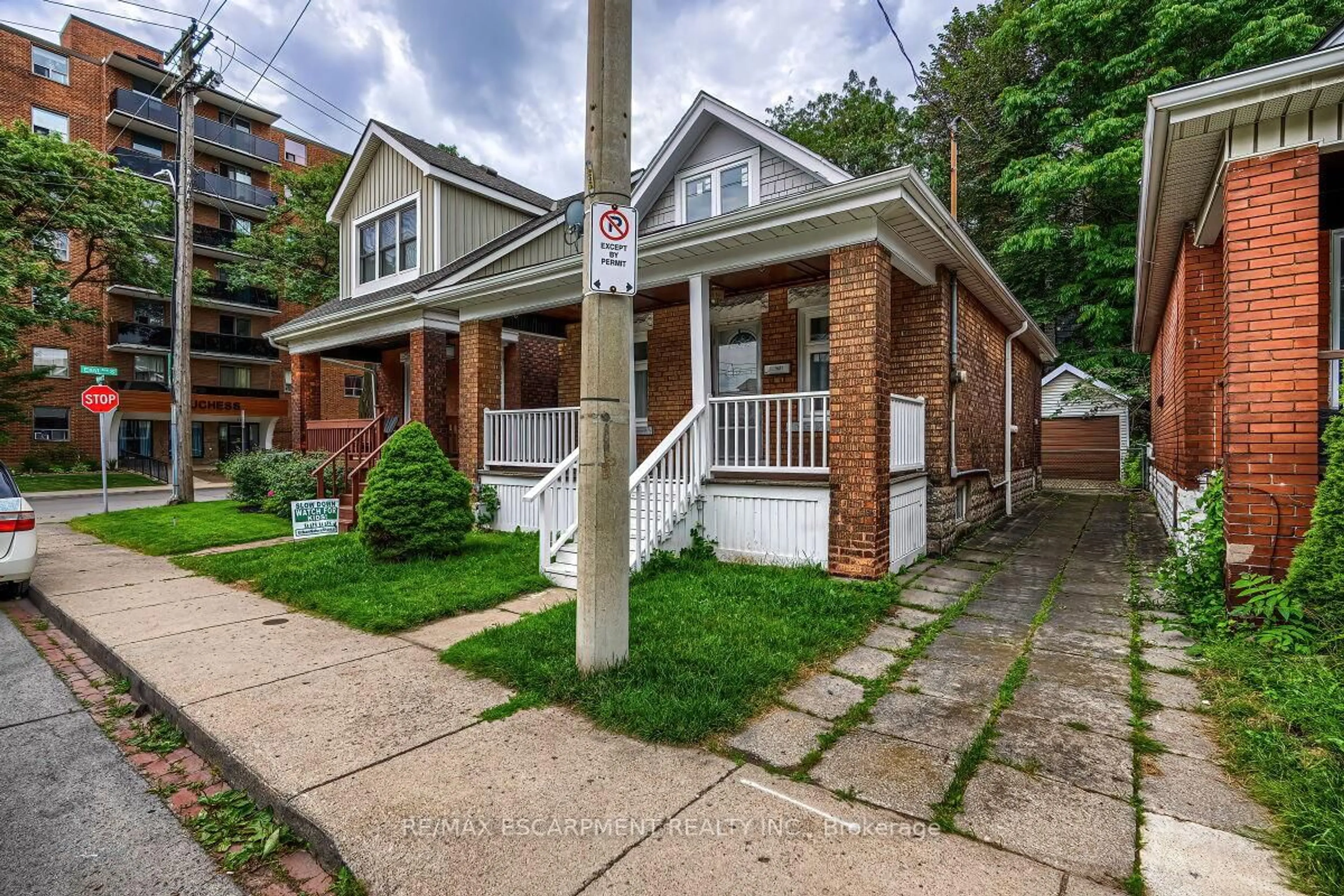 Home with brick exterior material, street for 30 Webber Ave, Hamilton Ontario L8N 1W3