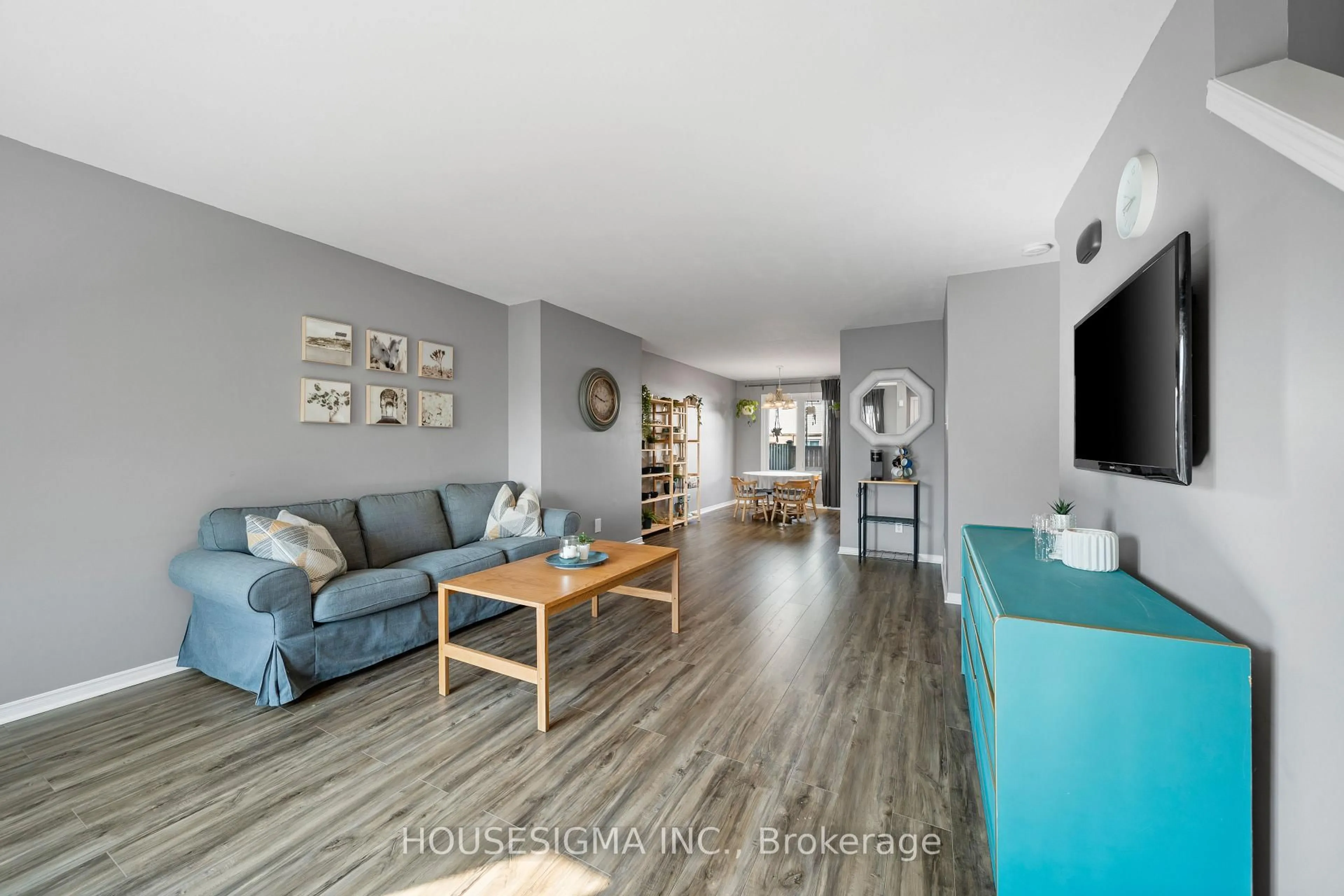 Living room with furniture, wood/laminate floor for 1225 Cheapside St #4, London East Ontario N5Y 5M8