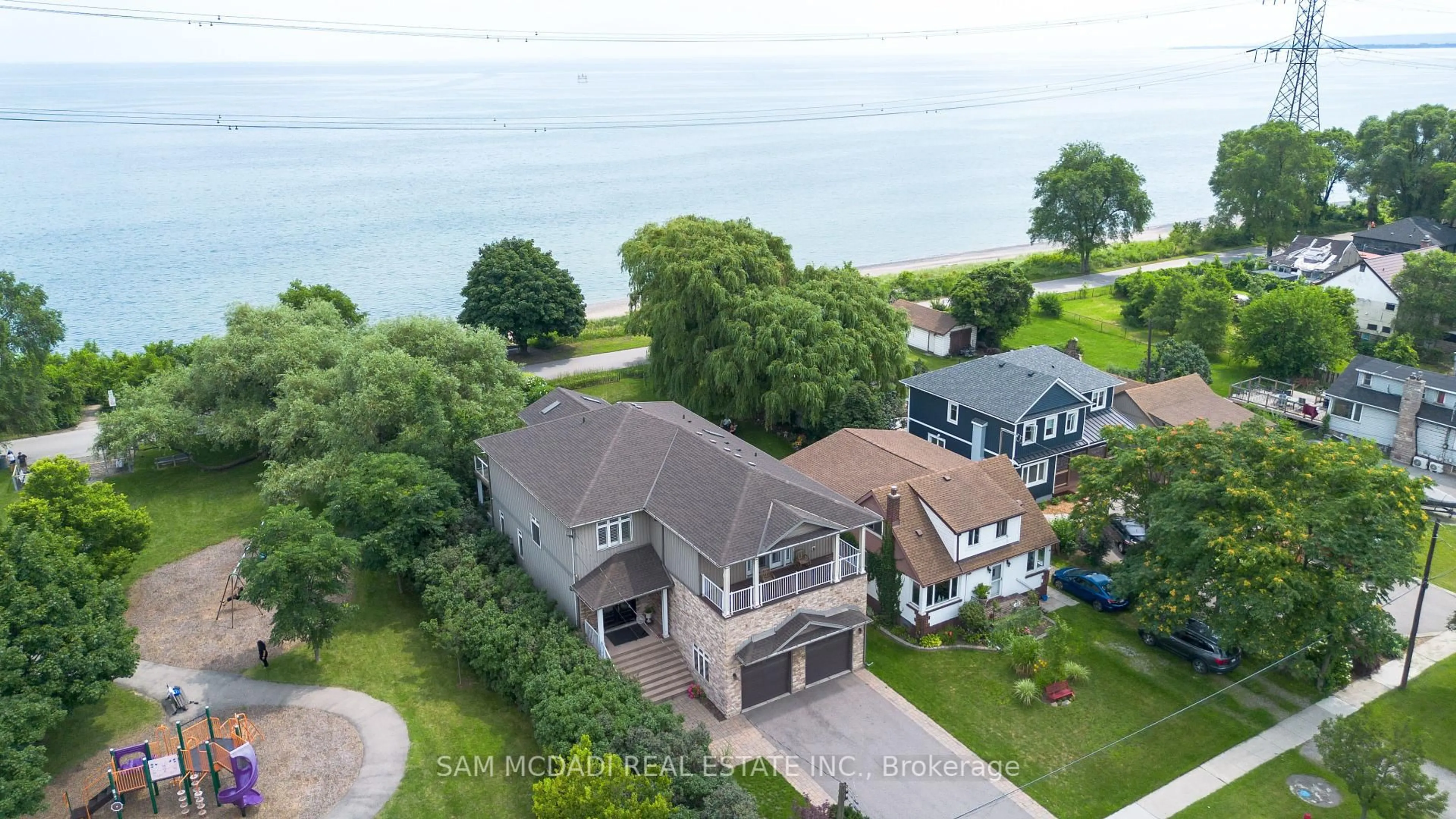 A pic from outside/outdoor area/front of a property/back of a property/a pic from drone, water/lake/river/ocean view for 187 Beach Blvd, Hamilton Ontario L8H 6V8