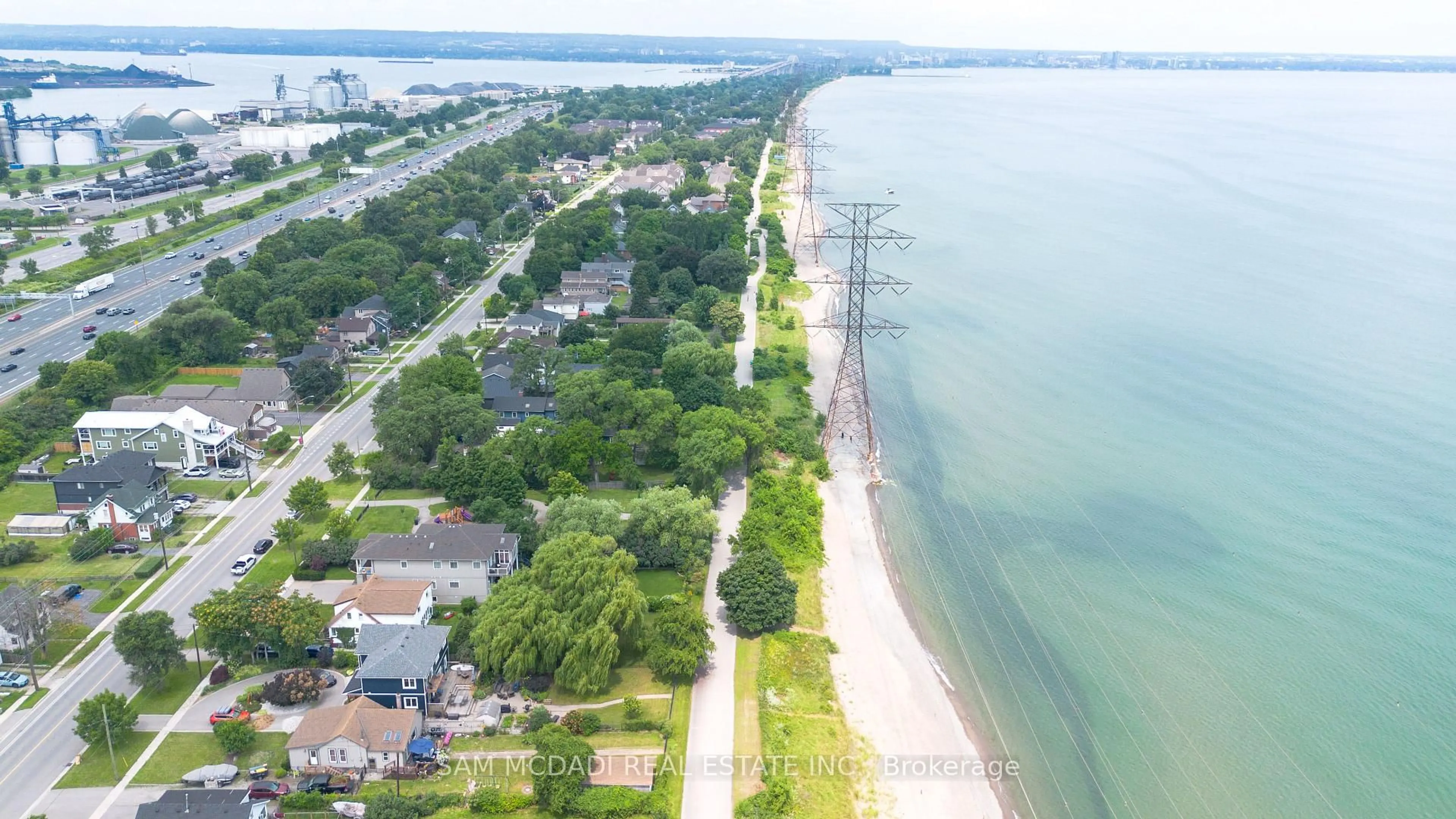 A pic from outside/outdoor area/front of a property/back of a property/a pic from drone, water/lake/river/ocean view for 187 Beach Blvd, Hamilton Ontario L8H 6V8