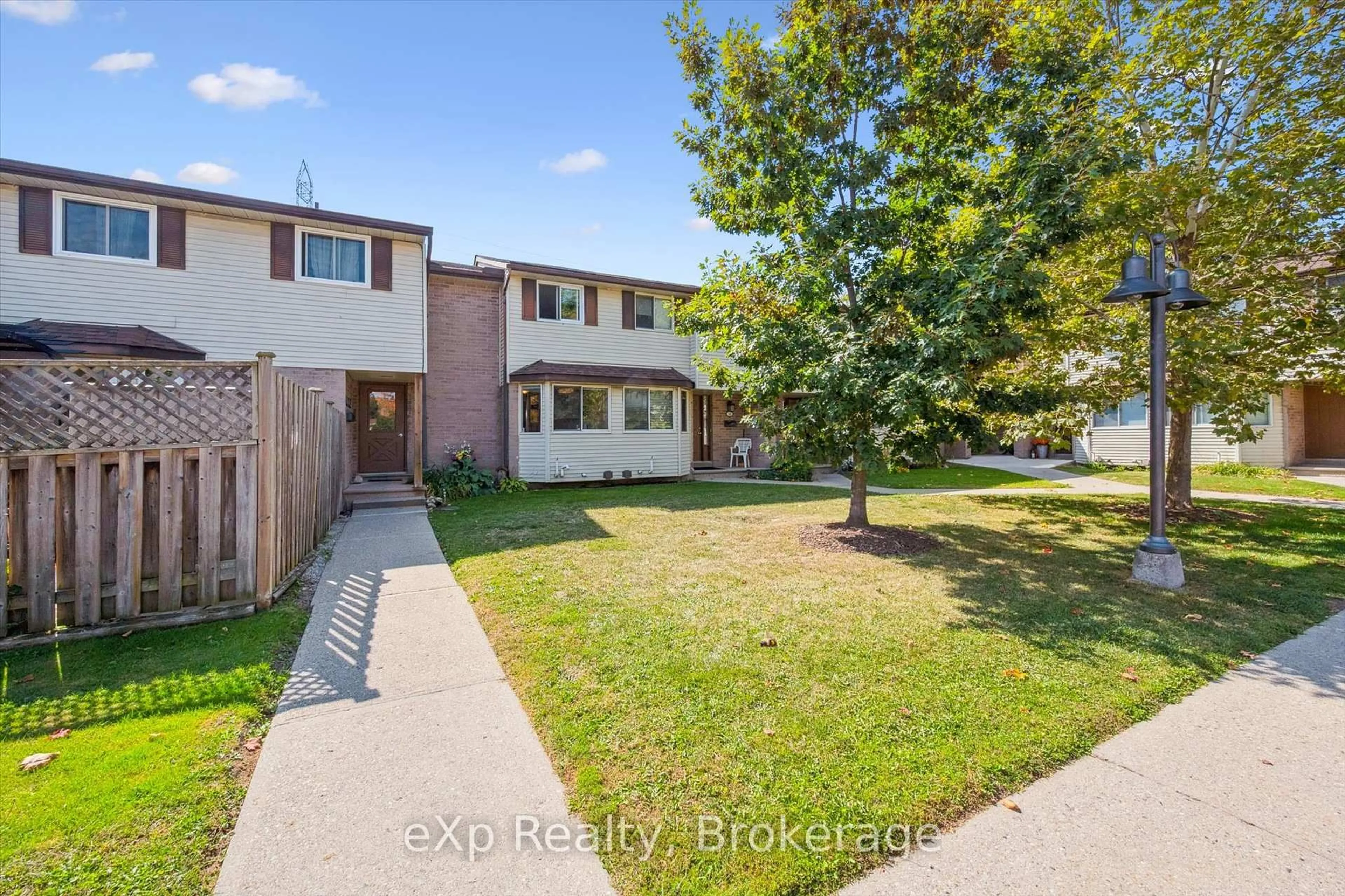 A pic from outside/outdoor area/front of a property/back of a property/a pic from drone, street for 40 Silvercreek Pkwy #44, Guelph Ontario N1H 7X5