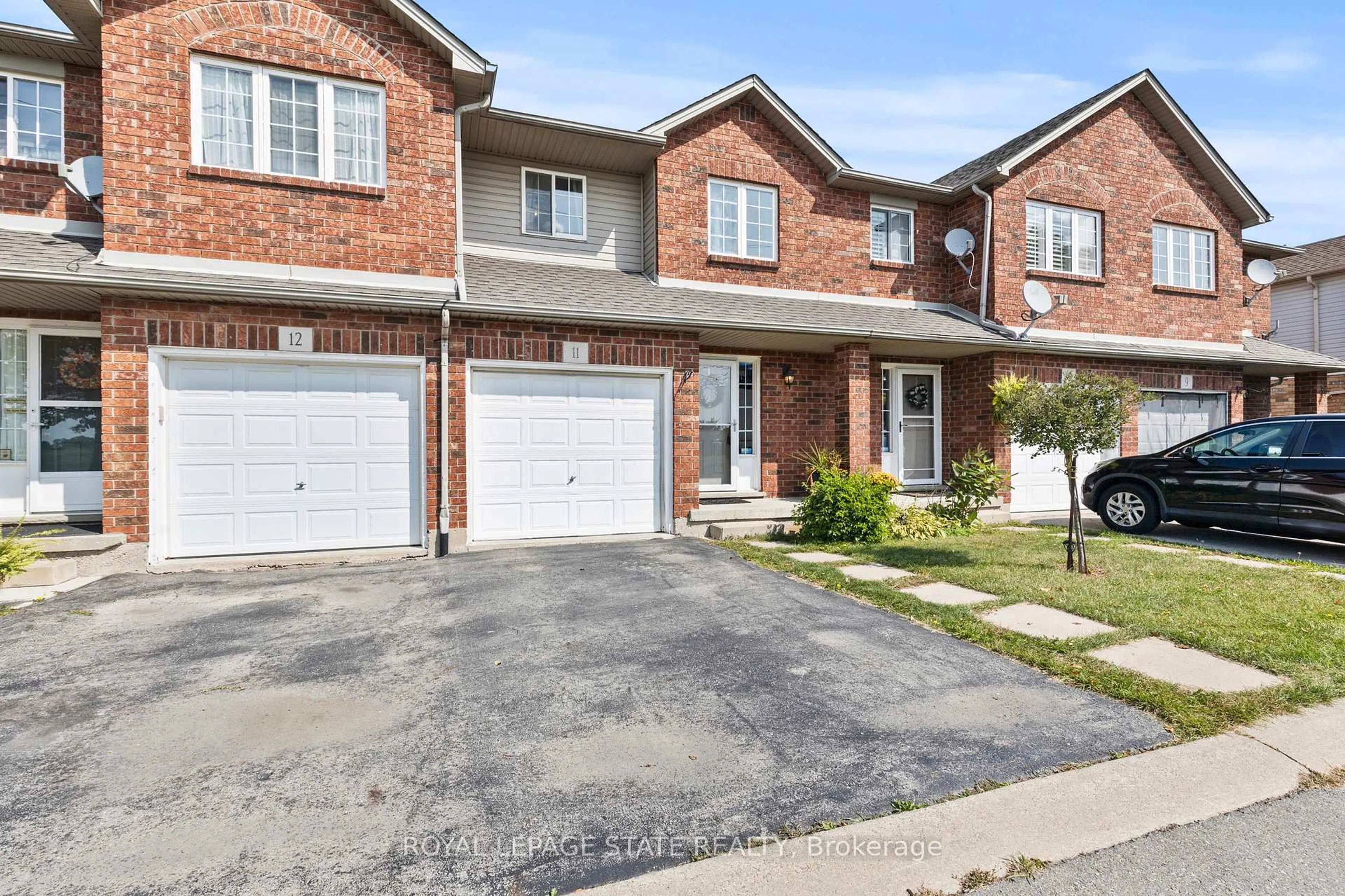 Home with brick exterior material, street for 1860 Upper Gage Ave #11, Hamilton Ontario L8W 3Y6