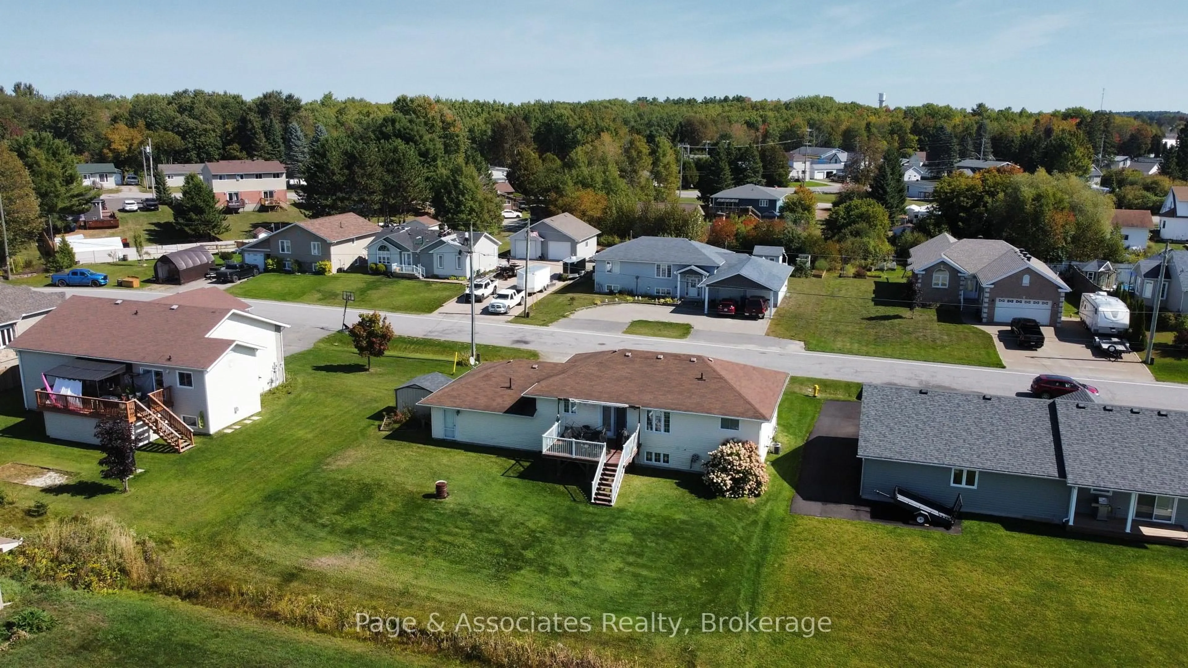 A pic from outside/outdoor area/front of a property/back of a property/a pic from drone, water/lake/river/ocean view for 37 Tamerack Ave, West Nipissing Ontario P2B 3H3