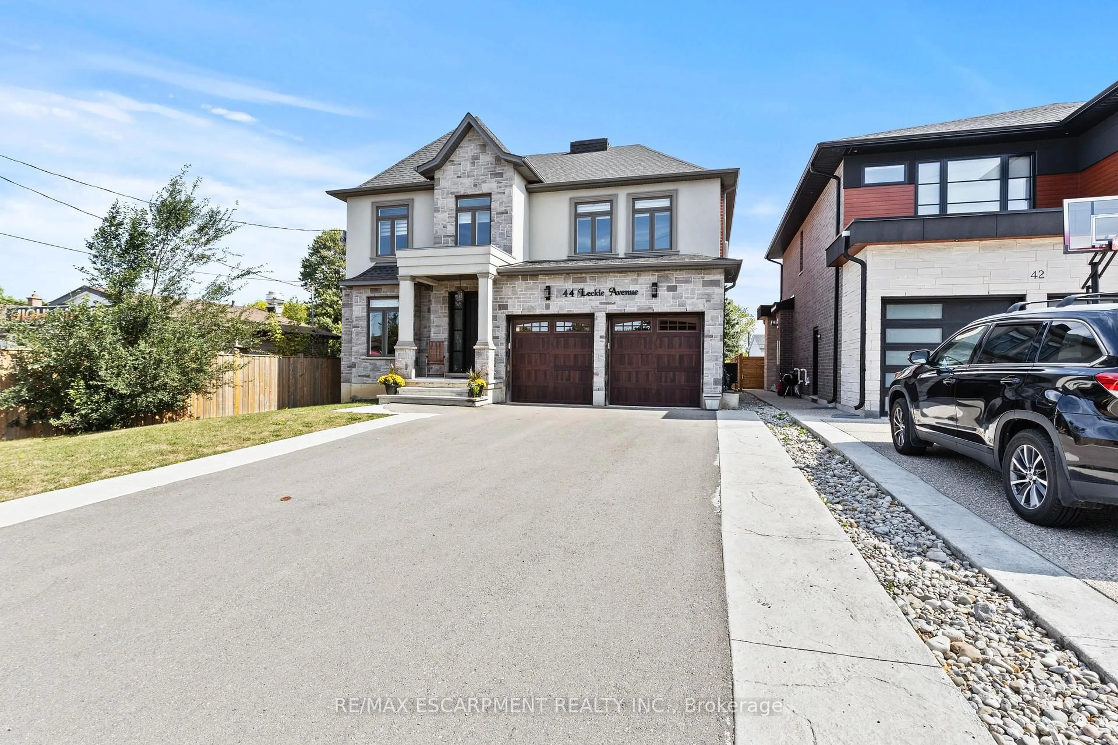 Home with brick exterior material, street for 44 Leckie Ave, Hamilton Ontario L8J 2S7