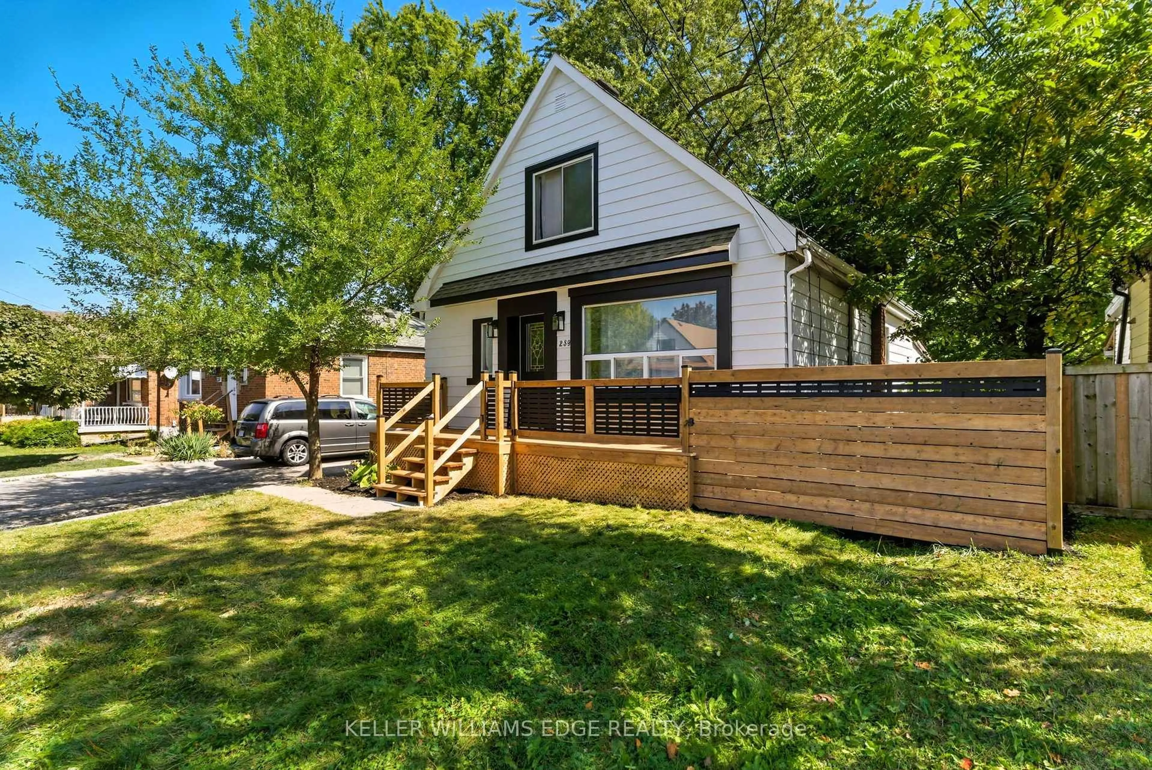Home with vinyl exterior material, street for 239 East 22nd St, Hamilton Ontario L8V 2V8