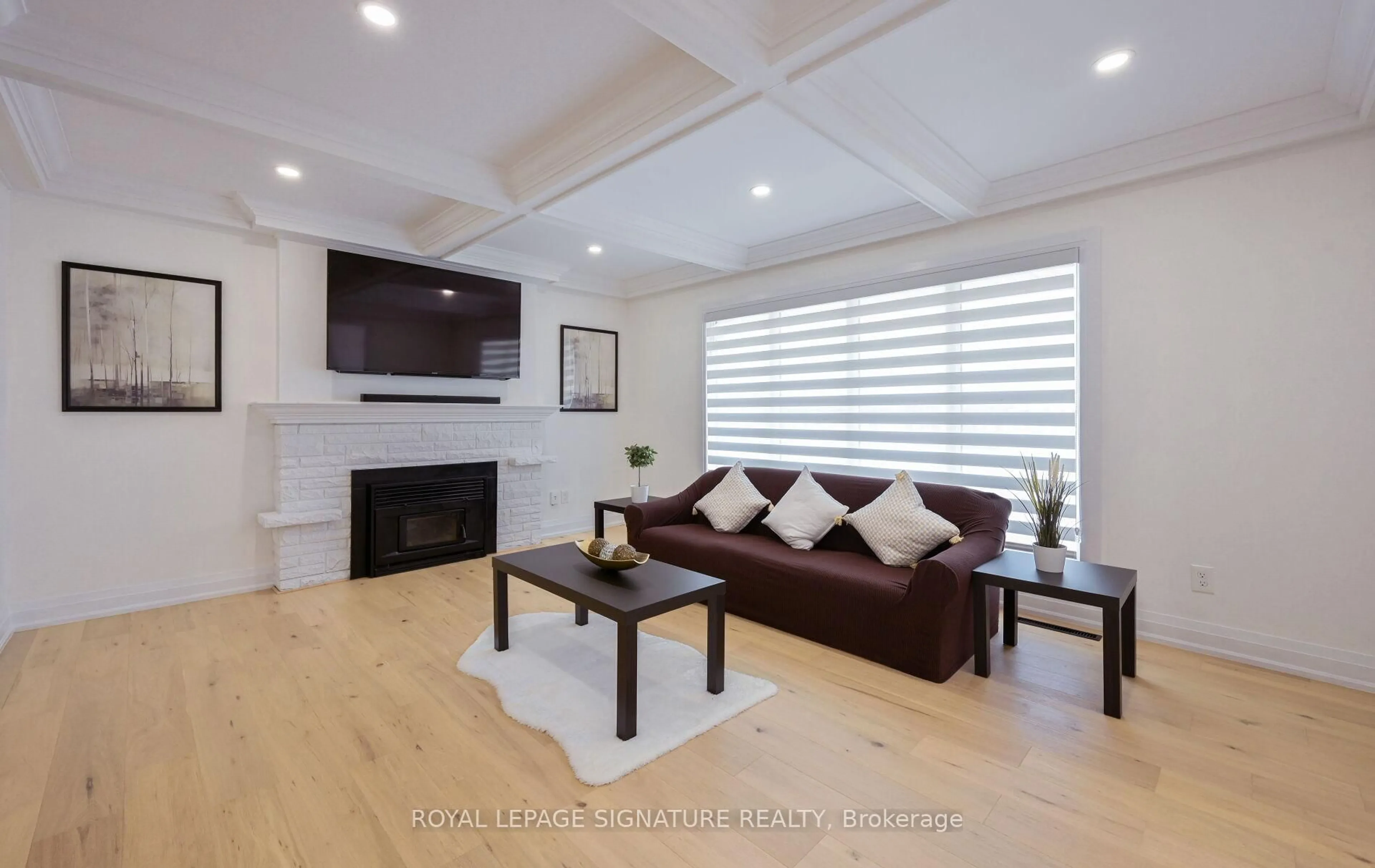 Living room with furniture, wood/laminate floor for 262 Barton St, Hamilton Ontario L8E 2K5