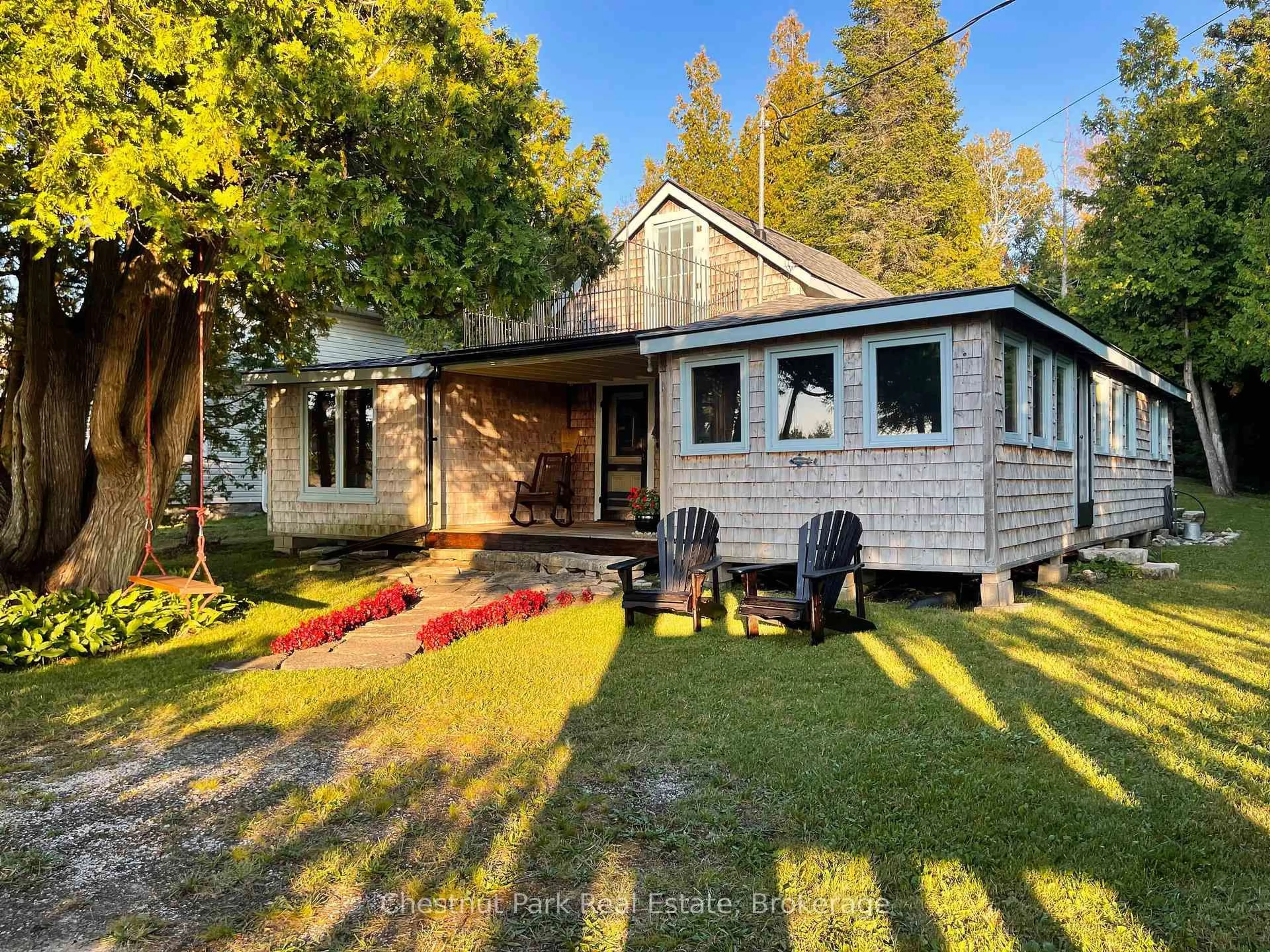 A pic from outside/outdoor area/front of a property/back of a property/a pic from drone, street for 111 Bay St, South Bruce Peninsula Ontario N0H 2T0