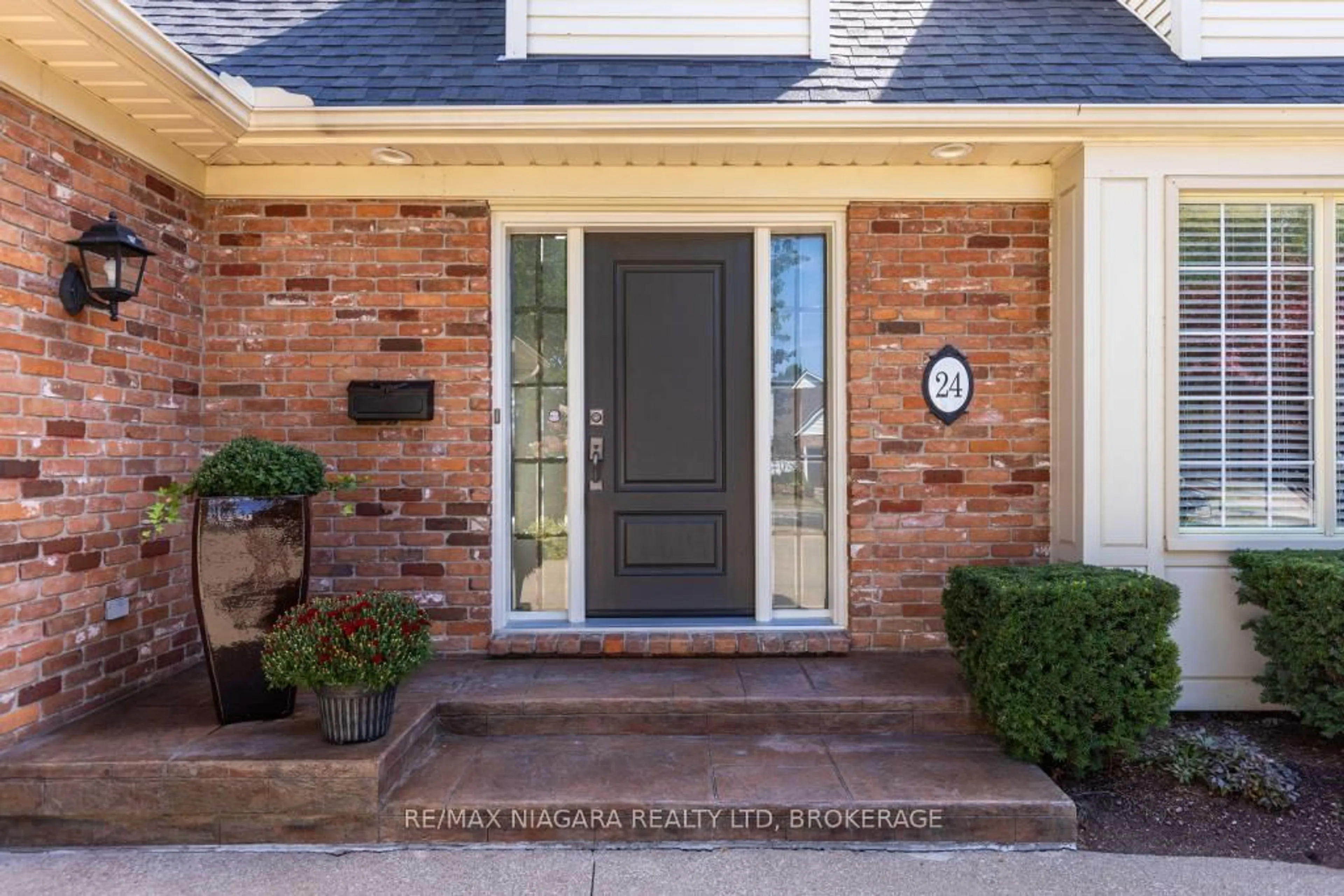 Home with brick exterior material, street for 24 Golden Blvd, St. Catharines Ontario L2N 7M9
