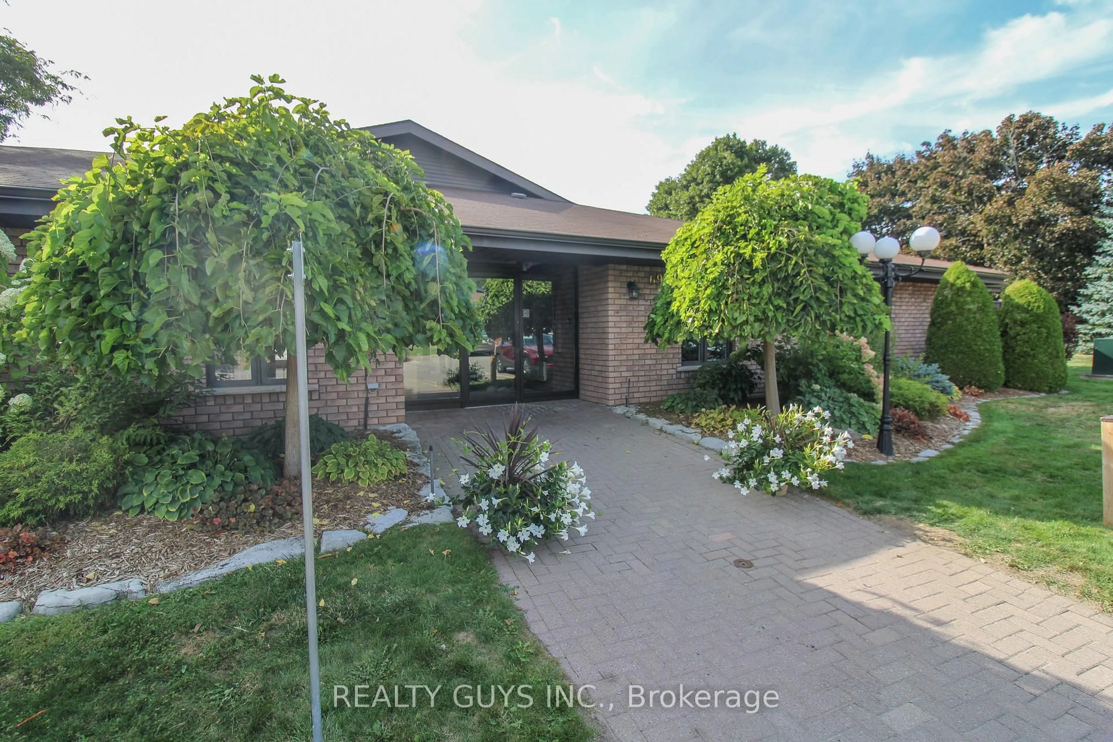 A pic from outside/outdoor area/front of a property/back of a property/a pic from drone, street for 693 Whitaker St #4, Peterborough Ontario K9H 7K3