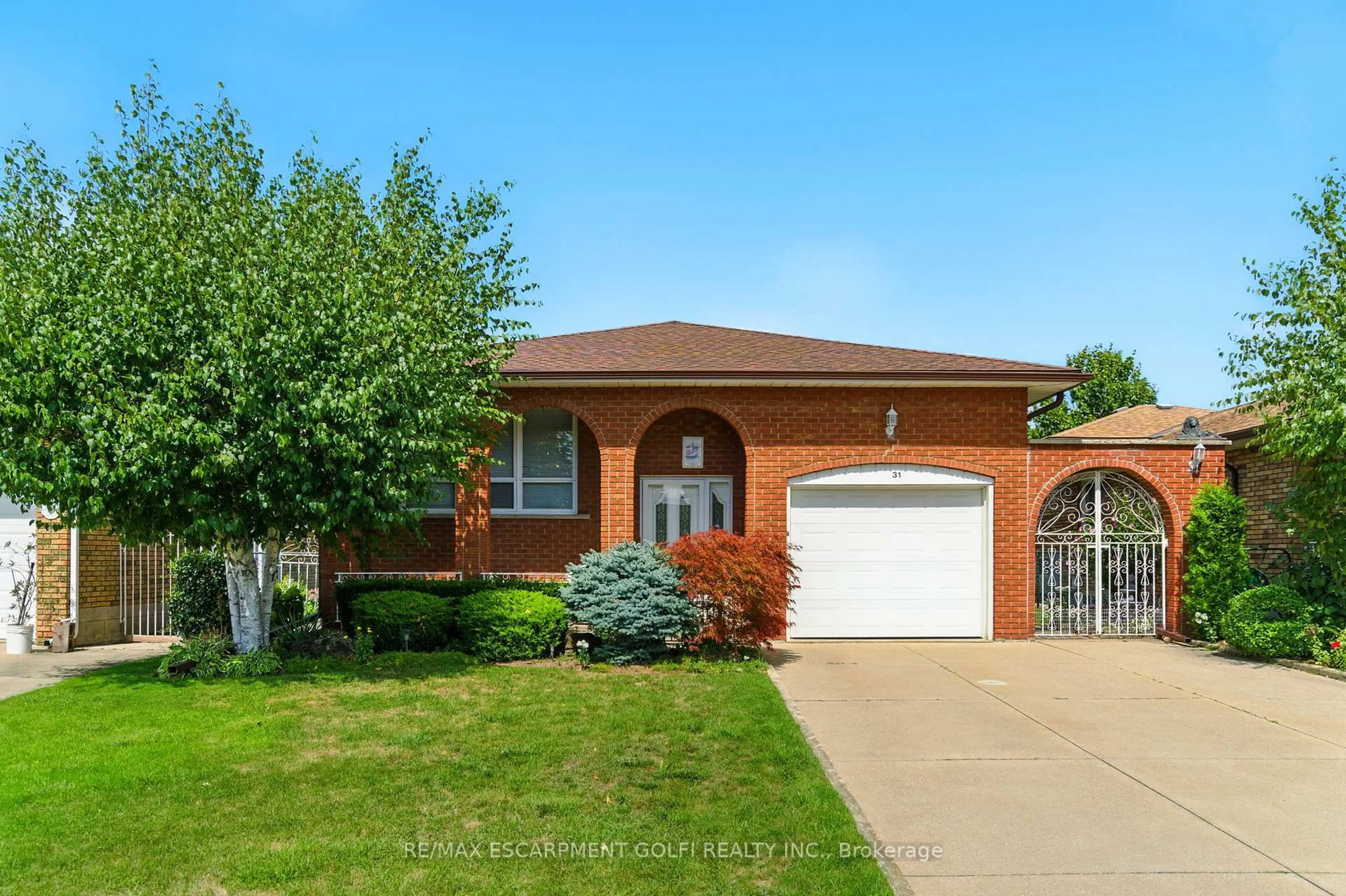 Home with brick exterior material, street for 31 Village Dr, Hamilton Ontario L8E 3M9