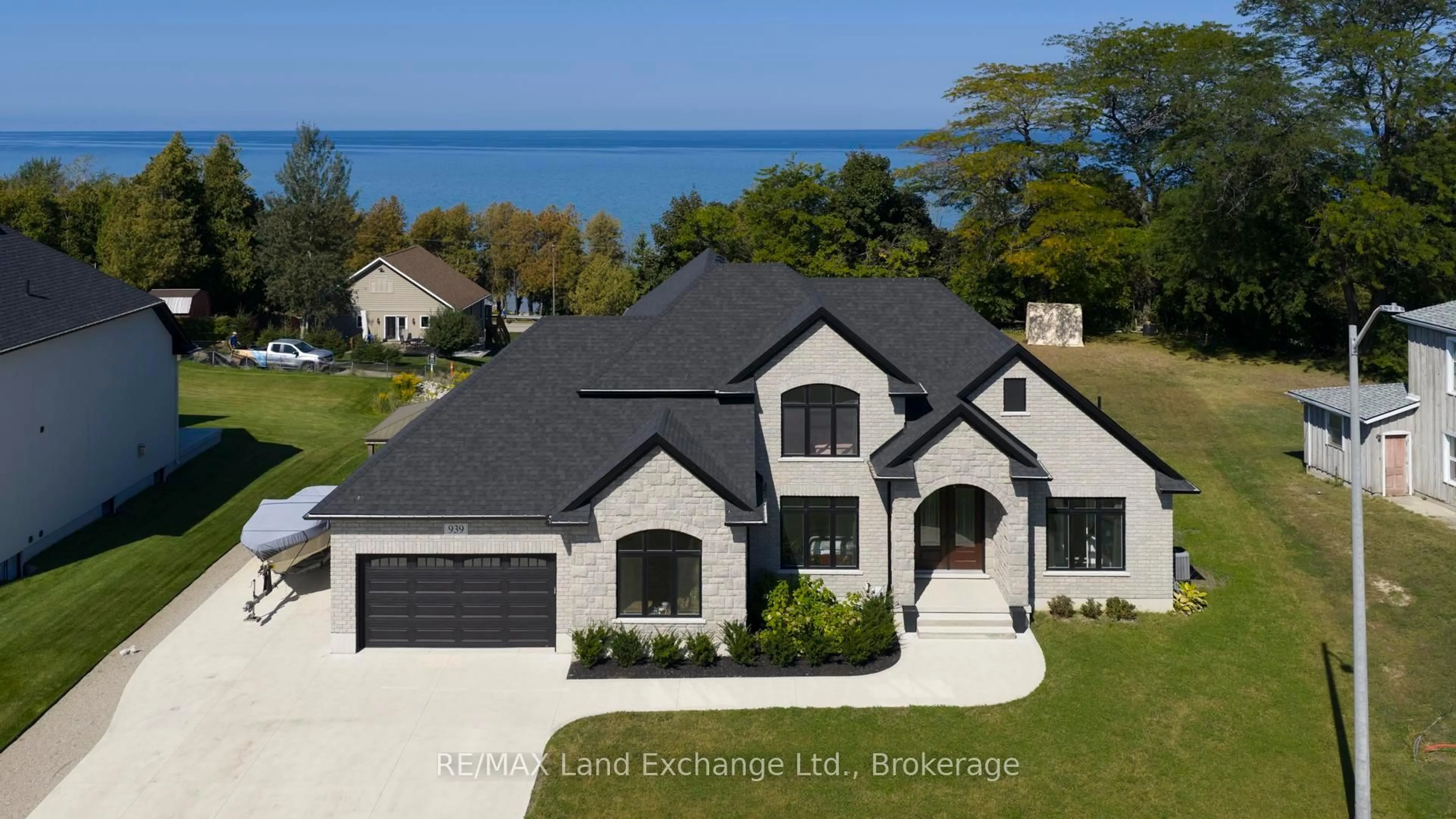 A pic from outside/outdoor area/front of a property/back of a property/a pic from drone, water/lake/river/ocean view for 939 Bogdanovic Way, Huron-Kinloss Ontario N2Z 0H4