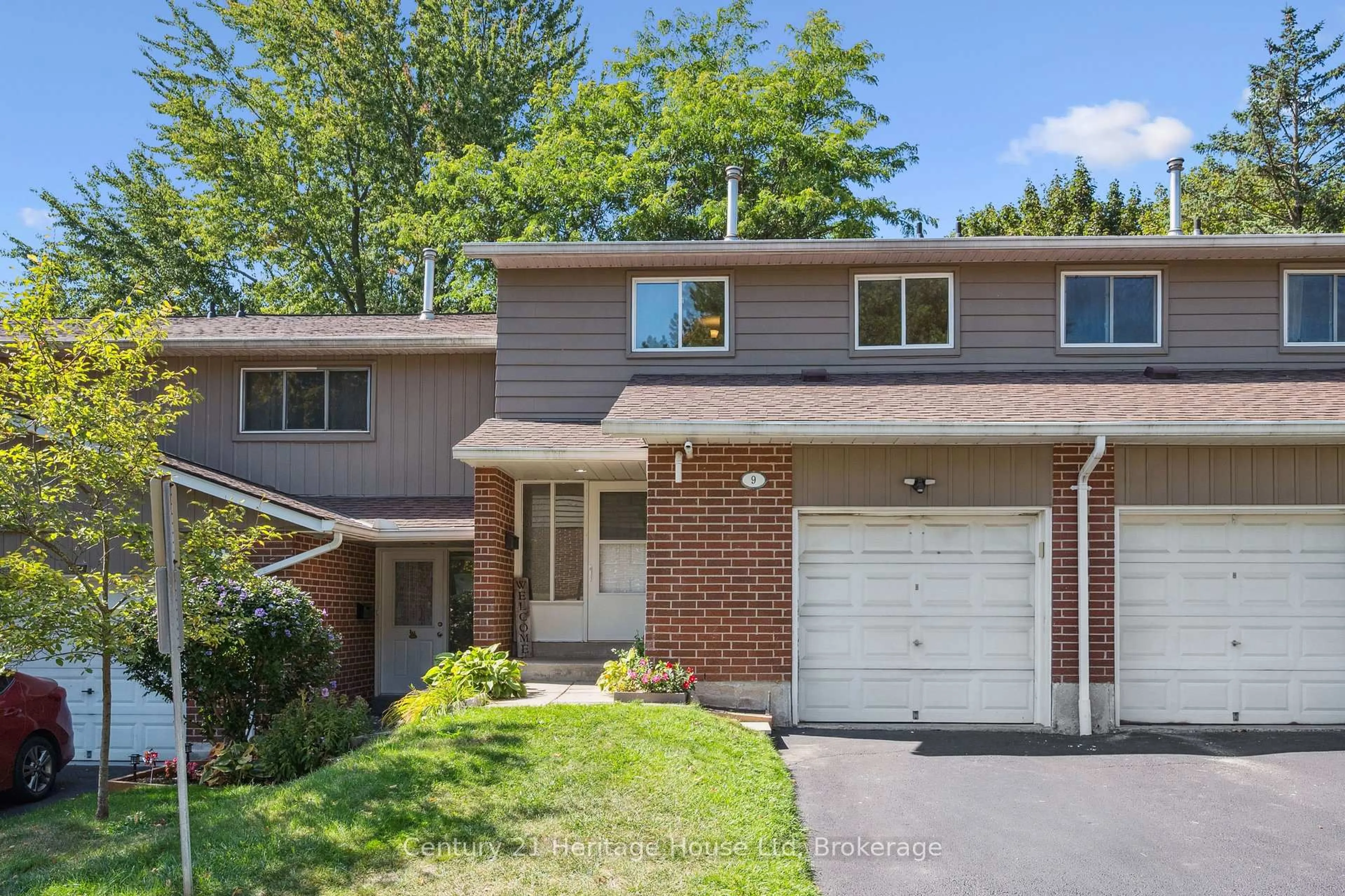 Home with brick exterior material, street for 16 Hadati Rd #9, Guelph Ontario N1E 6M2