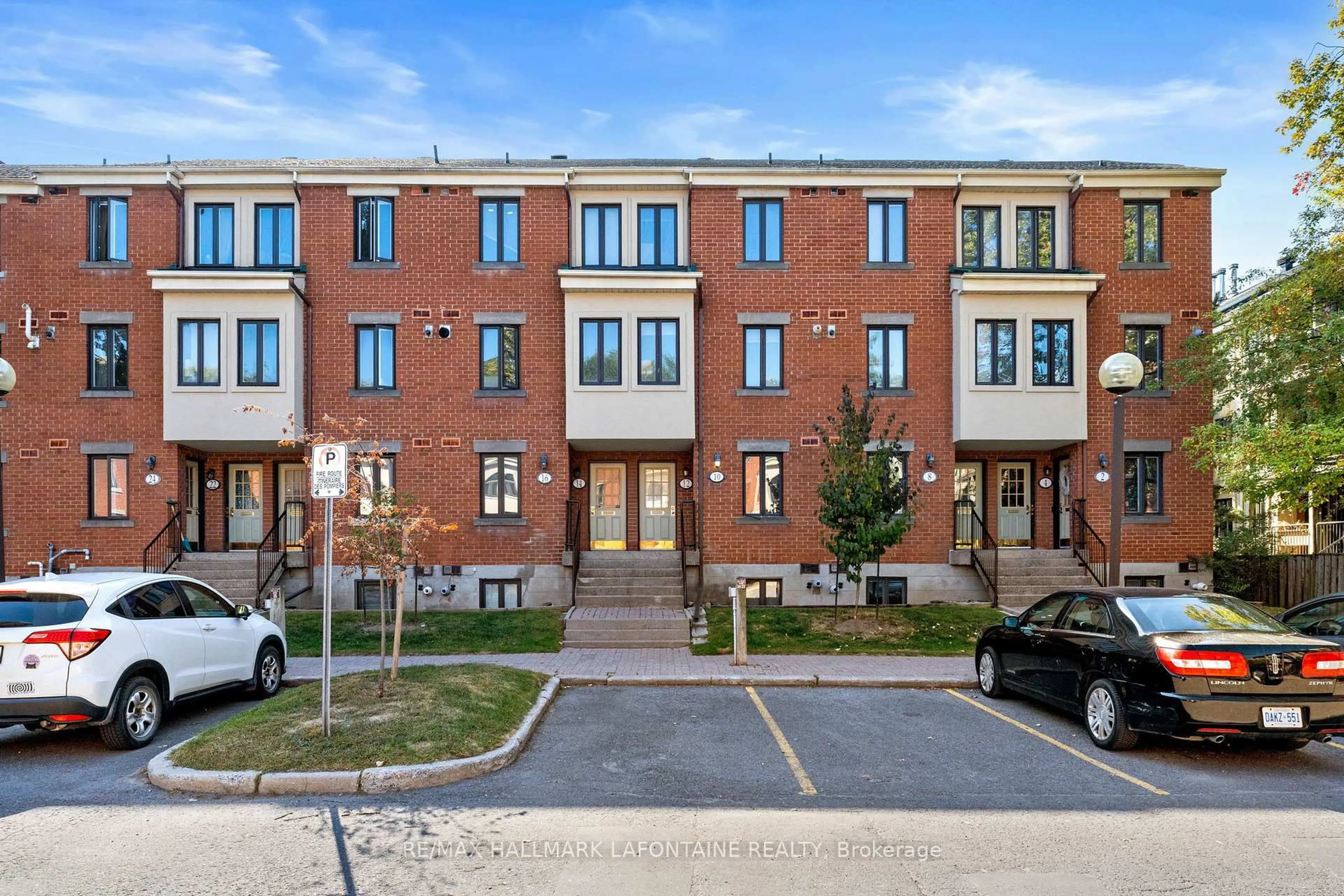 Home with brick exterior material, street for 12 Crispin Private, Ottawa Ontario K1K 2T8