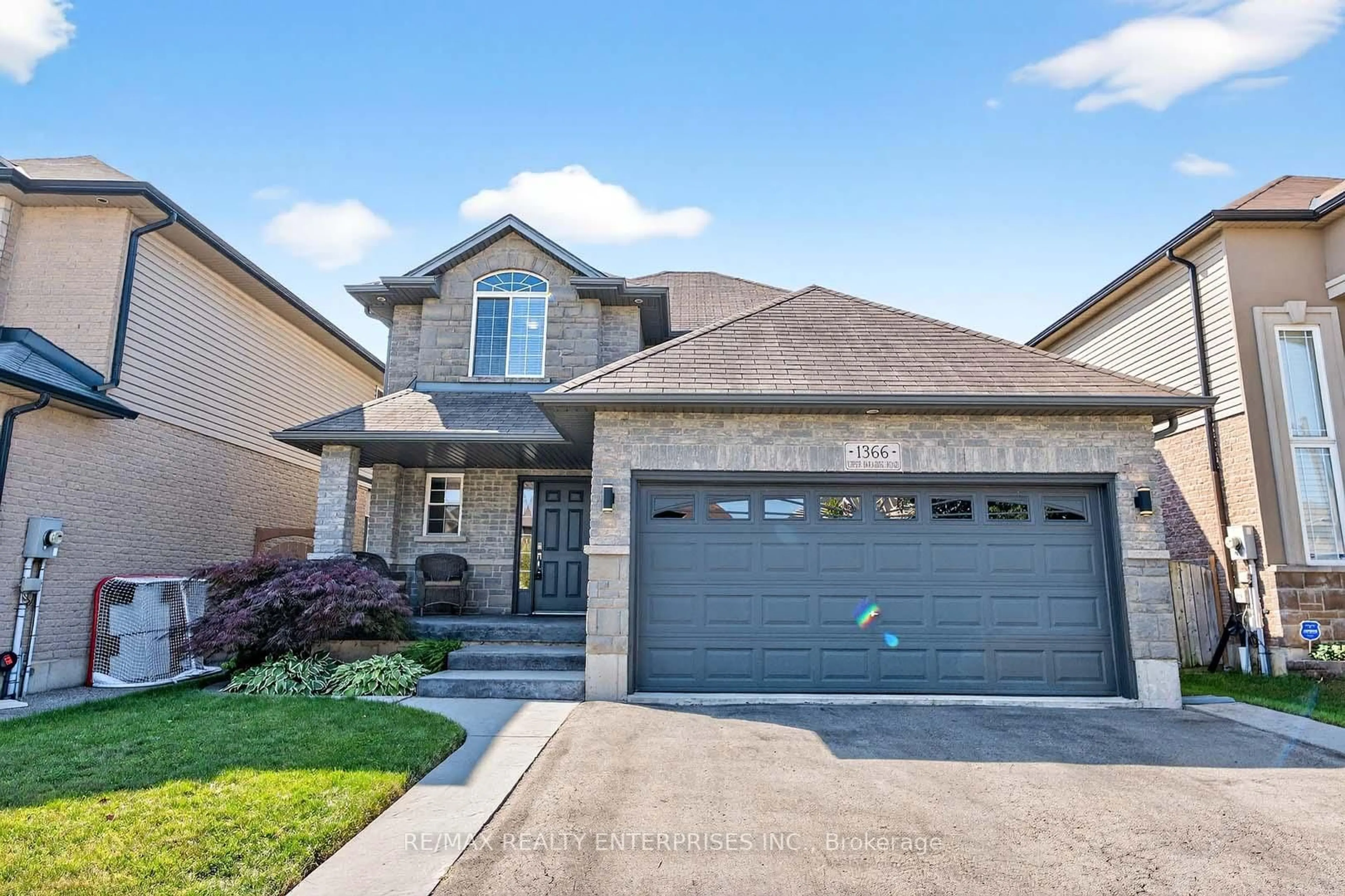 Home with brick exterior material, street for 1366 Upper Paradise Rd, Hamilton Ontario L9B 0C3