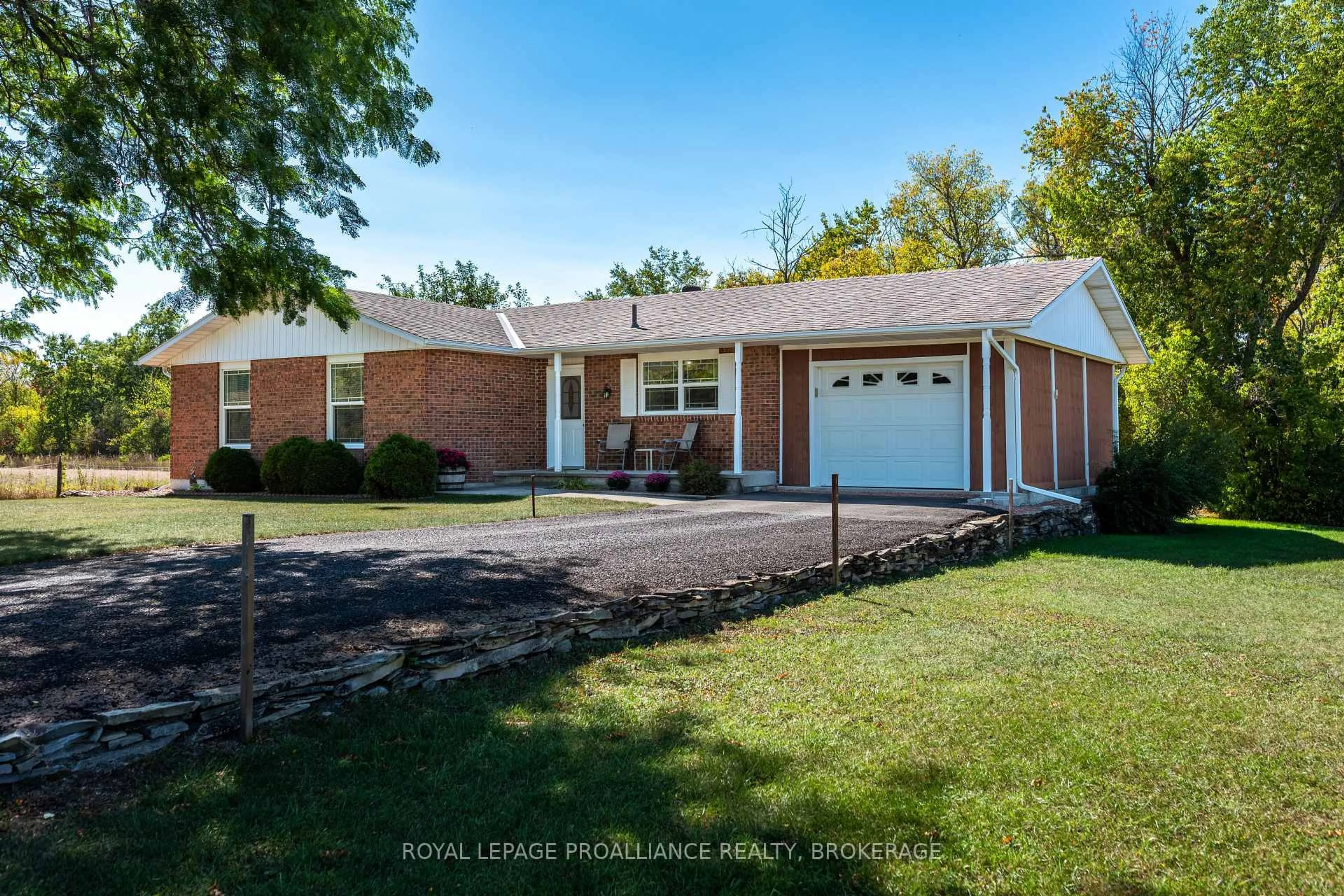 Home with brick exterior material, street for 3297 McGarvey Rd, Inverary Ontario K0H 1X0