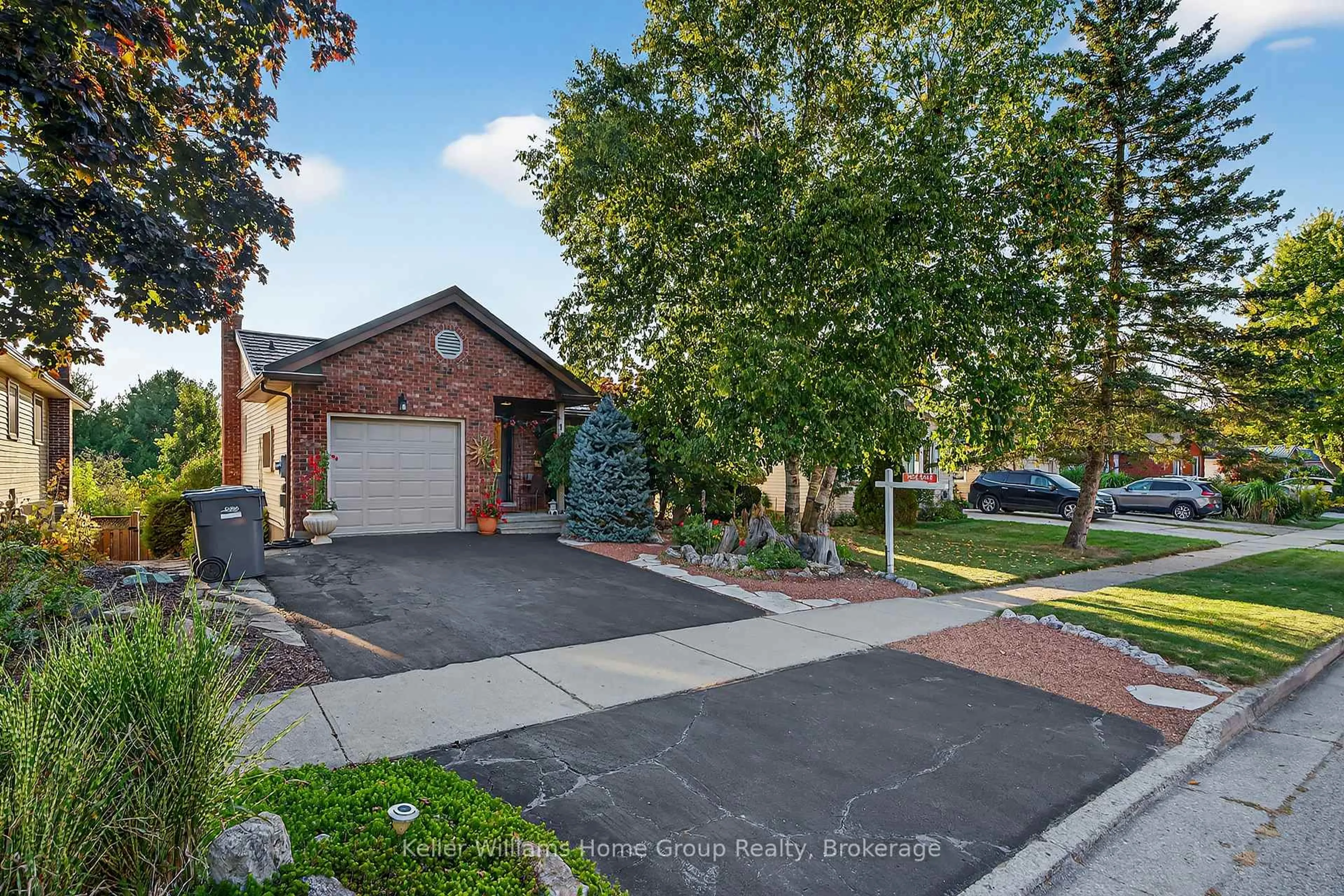 Home with brick exterior material, street for 114 Dovercliffe Rd, Guelph Ontario N1G 3A6