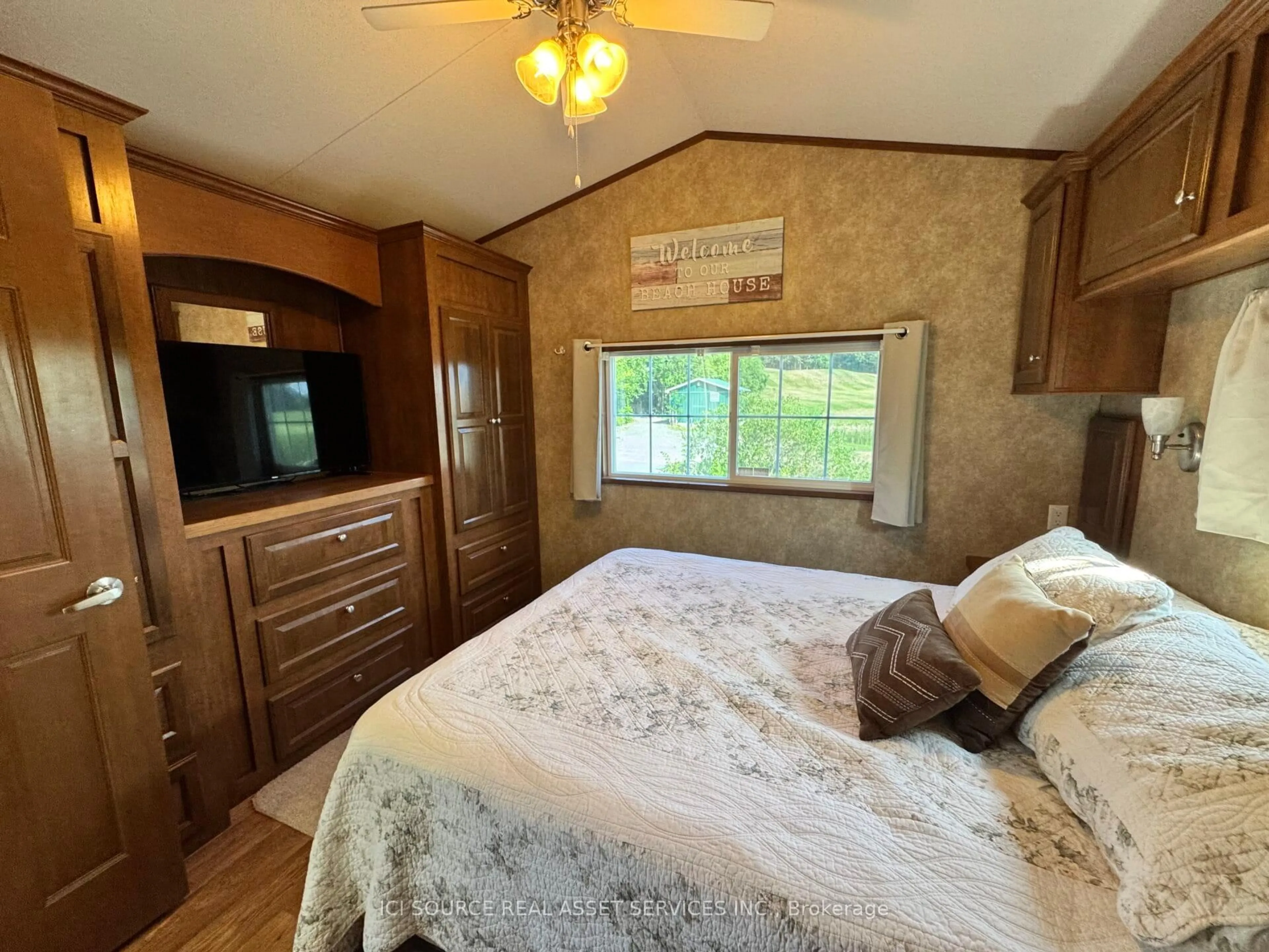 Bedroom with bed, wood/laminate floor for 1235 Villiers Line #GDF011, Otonabee-South Monaghan Ontario K0L 2G0