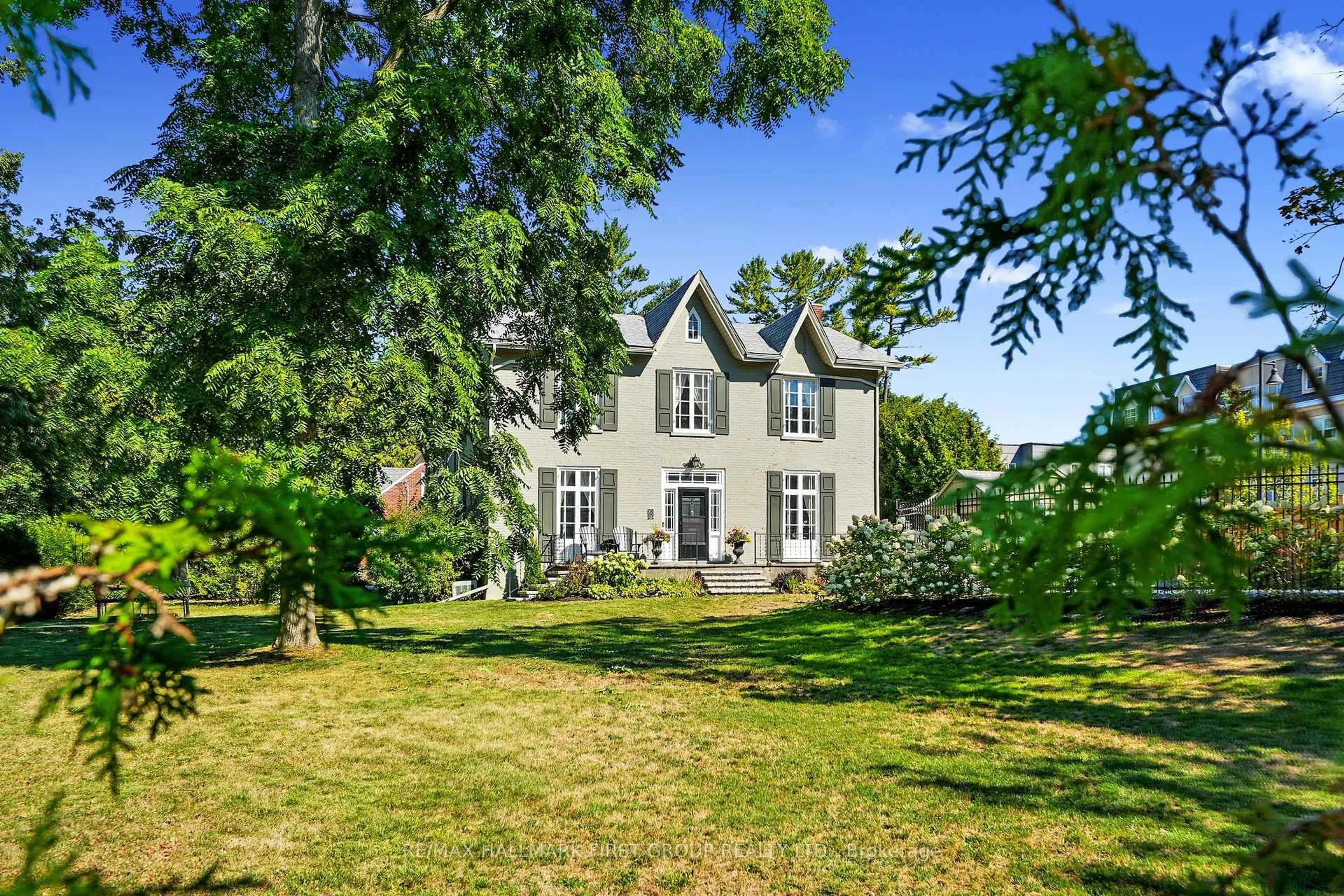 A pic from outside/outdoor area/front of a property/back of a property/a pic from drone, street for 308 Henry St, Cobourg Ontario K9A 3Y8