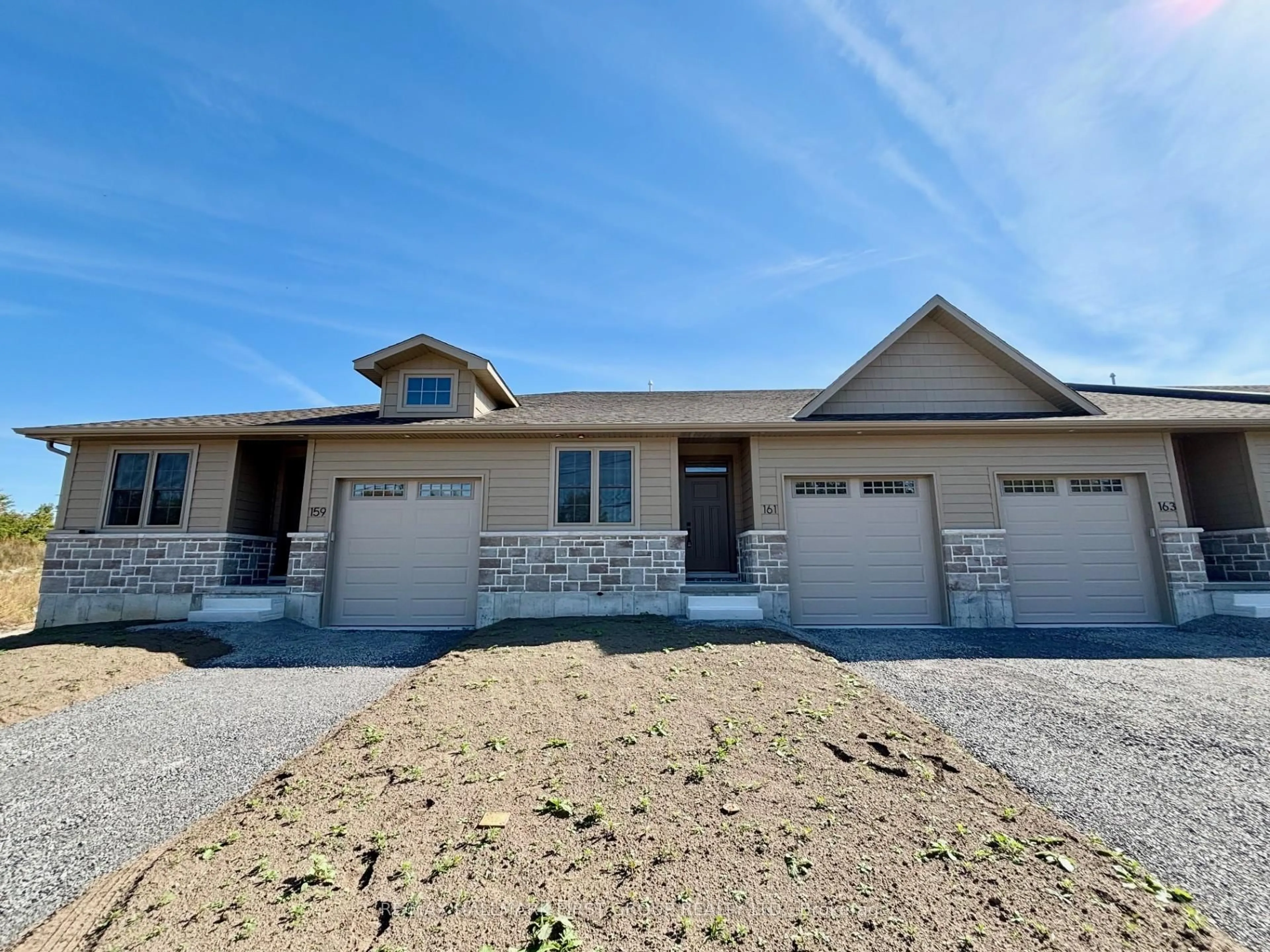 Home with vinyl exterior material, street for 161 Pomeroy Ave, Tweed Ontario K0K 3J0