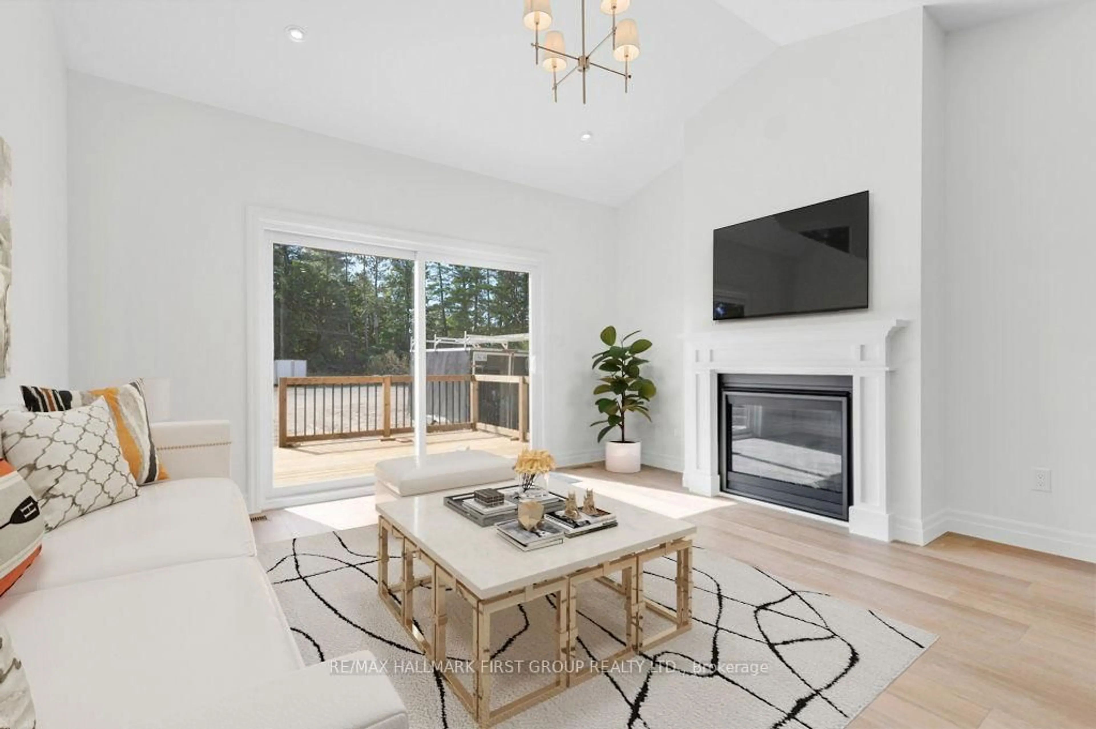 Living room with furniture, wood/laminate floor for 161 Pomeroy Ave, Tweed Ontario K0K 3J0