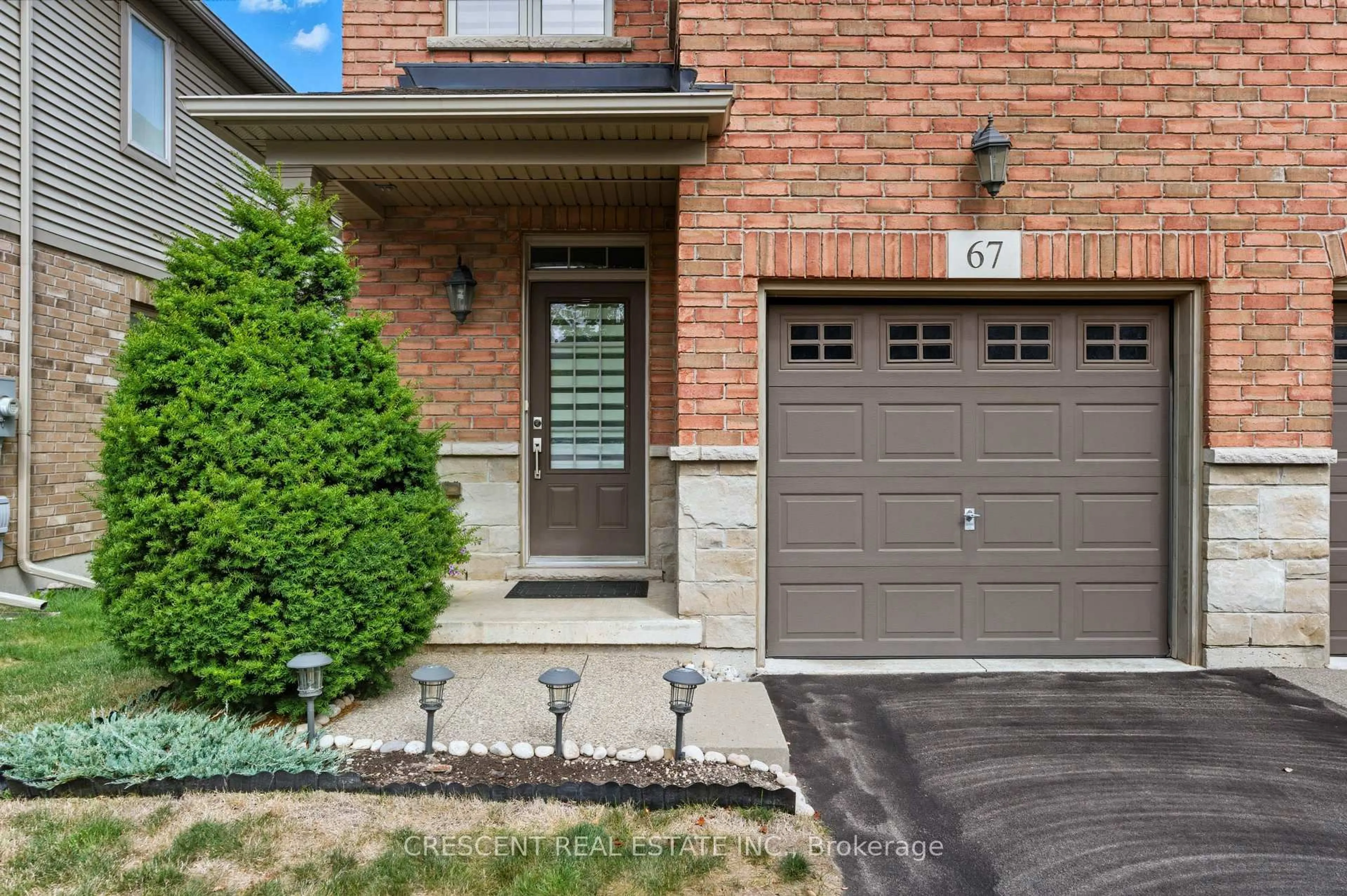 Home with brick exterior material, street for 515 Winston Rd #67, Grimsby Ontario L3M 4E8