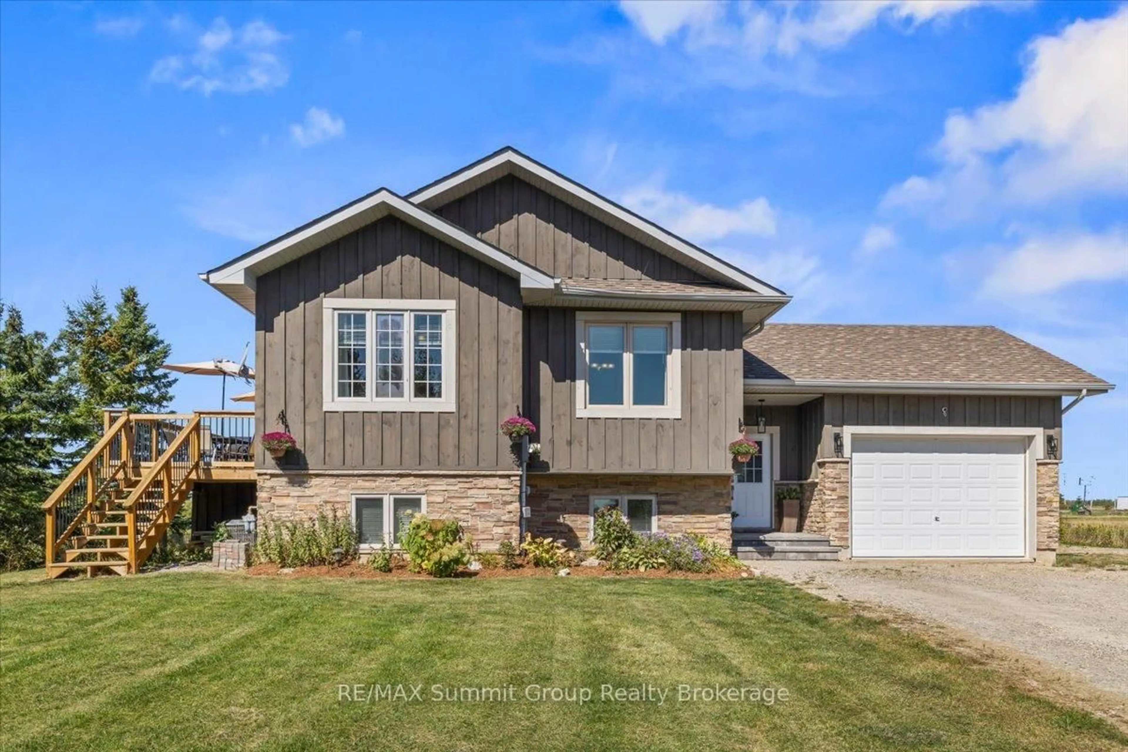 Home with vinyl exterior material, street for 682449 260 Sdrd, Melancthon Ontario L9V 2N1