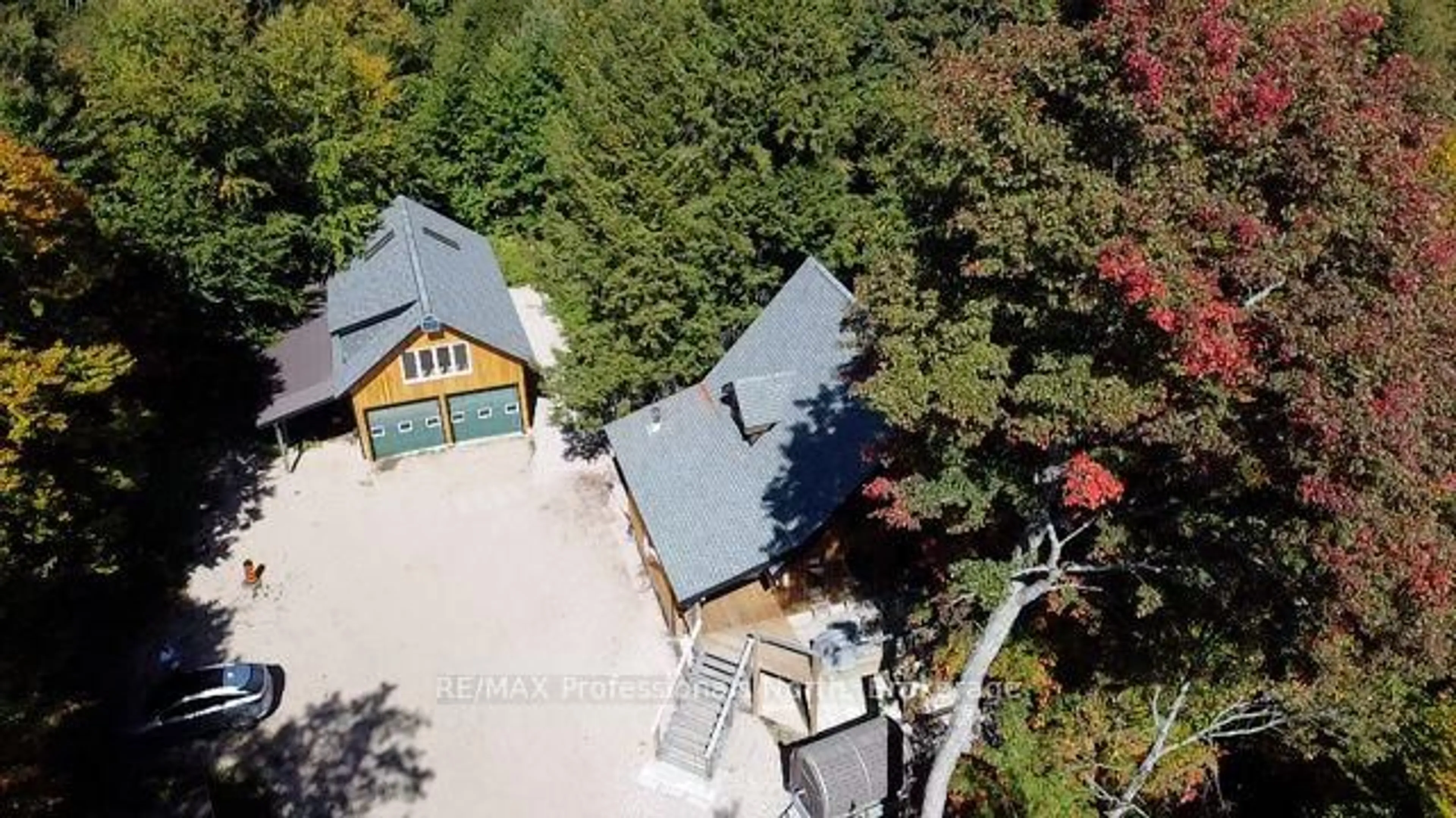 A pic from outside/outdoor area/front of a property/back of a property/a pic from drone, unknown for 298 Angus Point Rd, Machar Ontario P0A 1X0