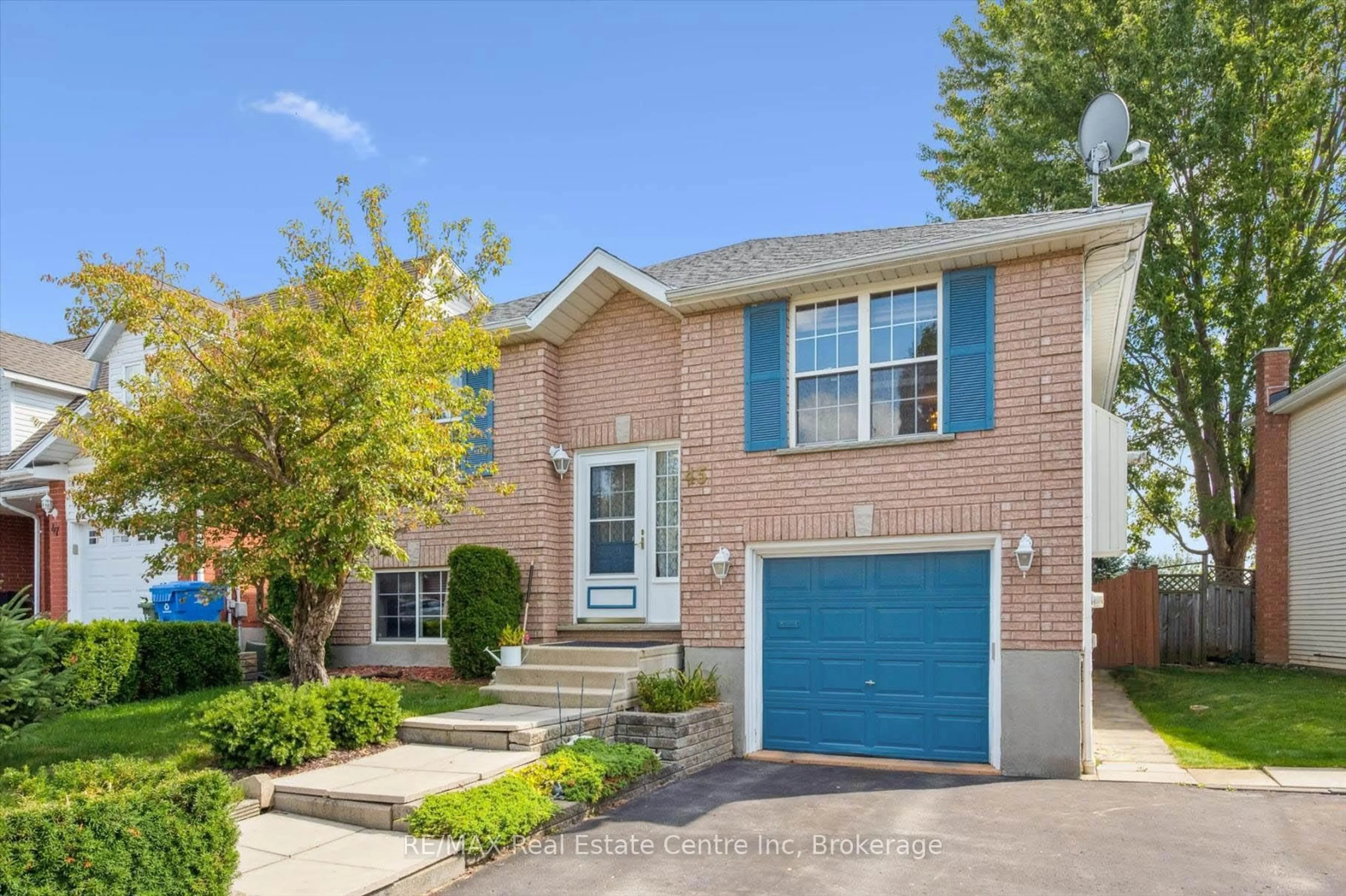 Home with brick exterior material, street for 45 Chesterton Lane, Guelph Ontario N1E 6S8
