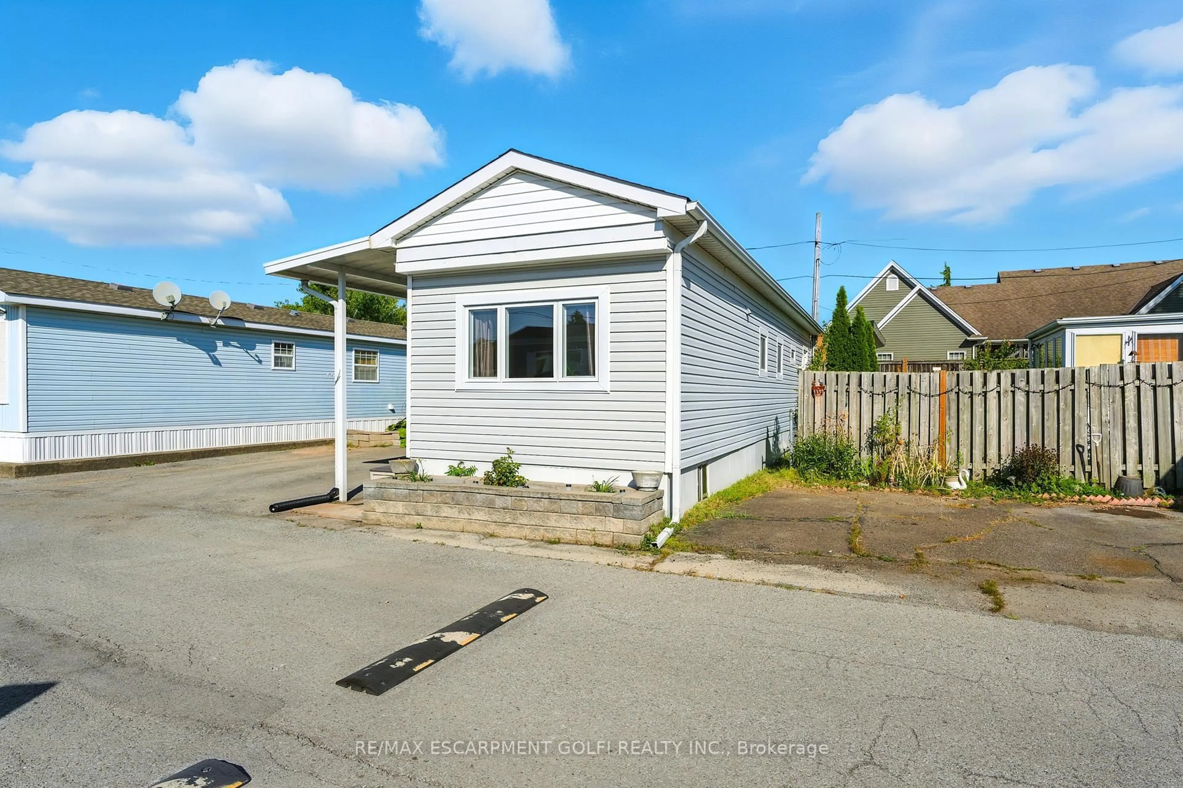 Home with vinyl exterior material, street for 241 St. Paul St #102, St. Catharines Ontario L2S 2E5