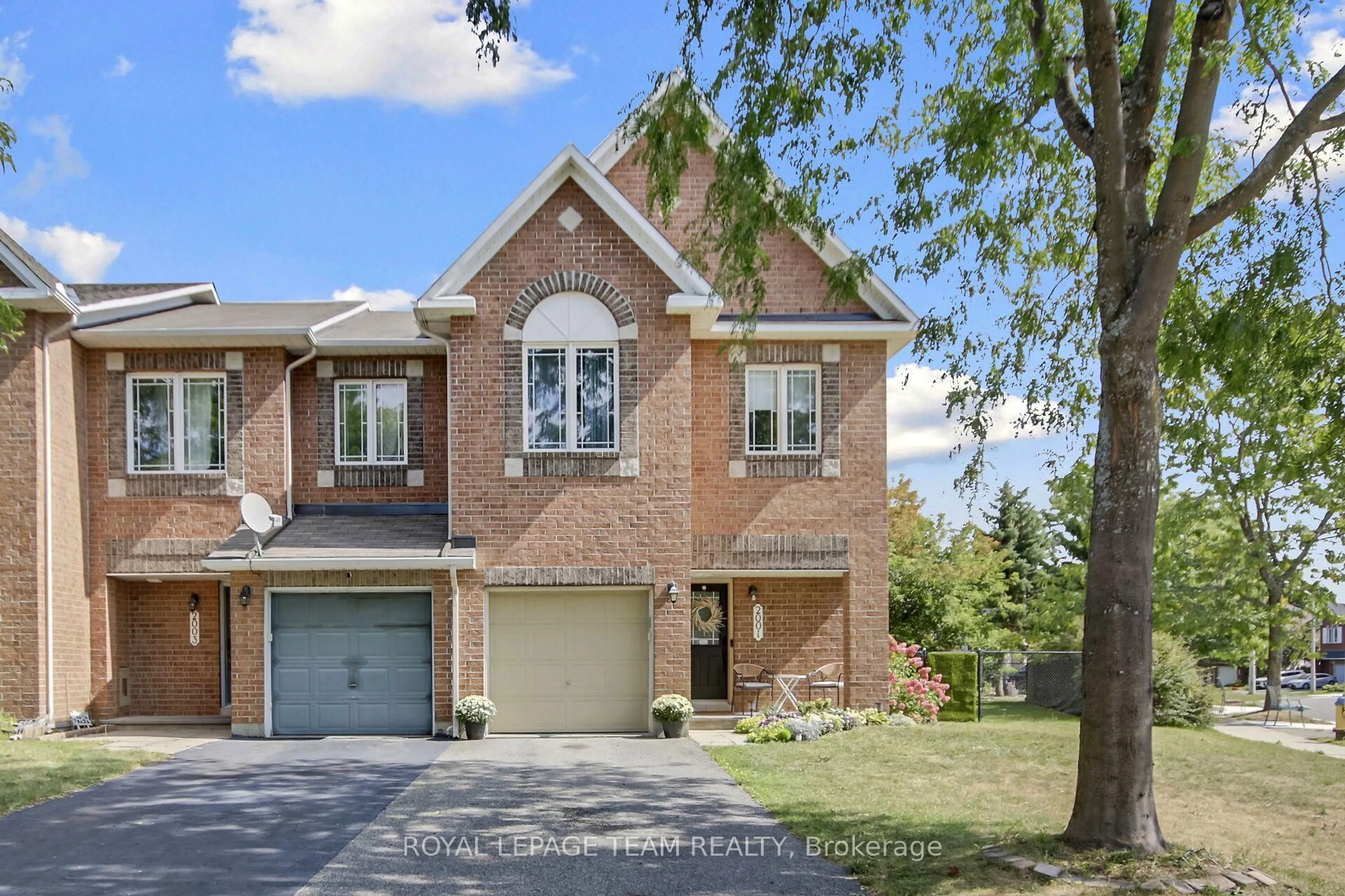 Home with brick exterior material, street for 2001 Dunollie Cres, Ottawa Ontario K2W 1H5