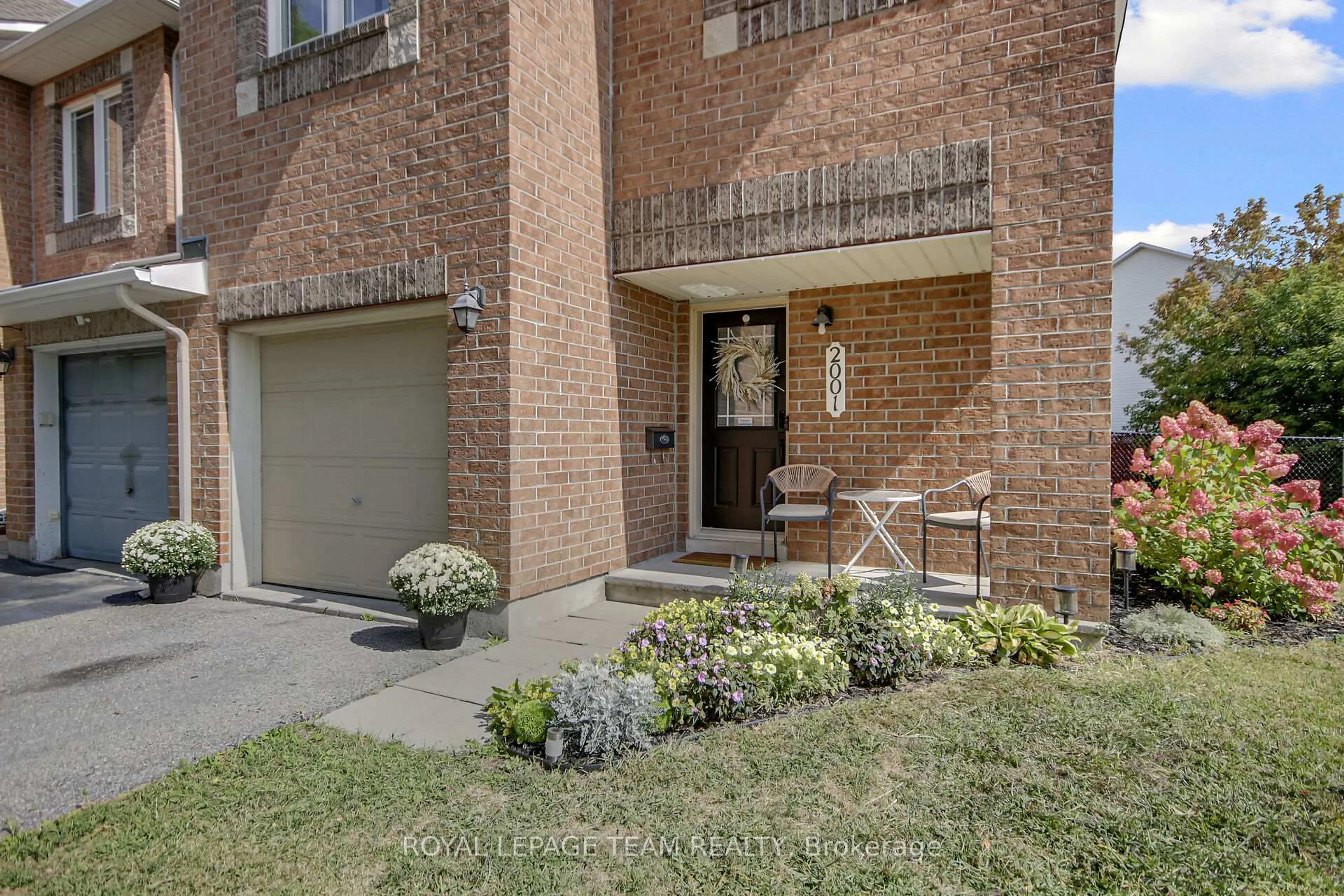 Home with brick exterior material, street for 2001 Dunollie Cres, Ottawa Ontario K2W 1H5