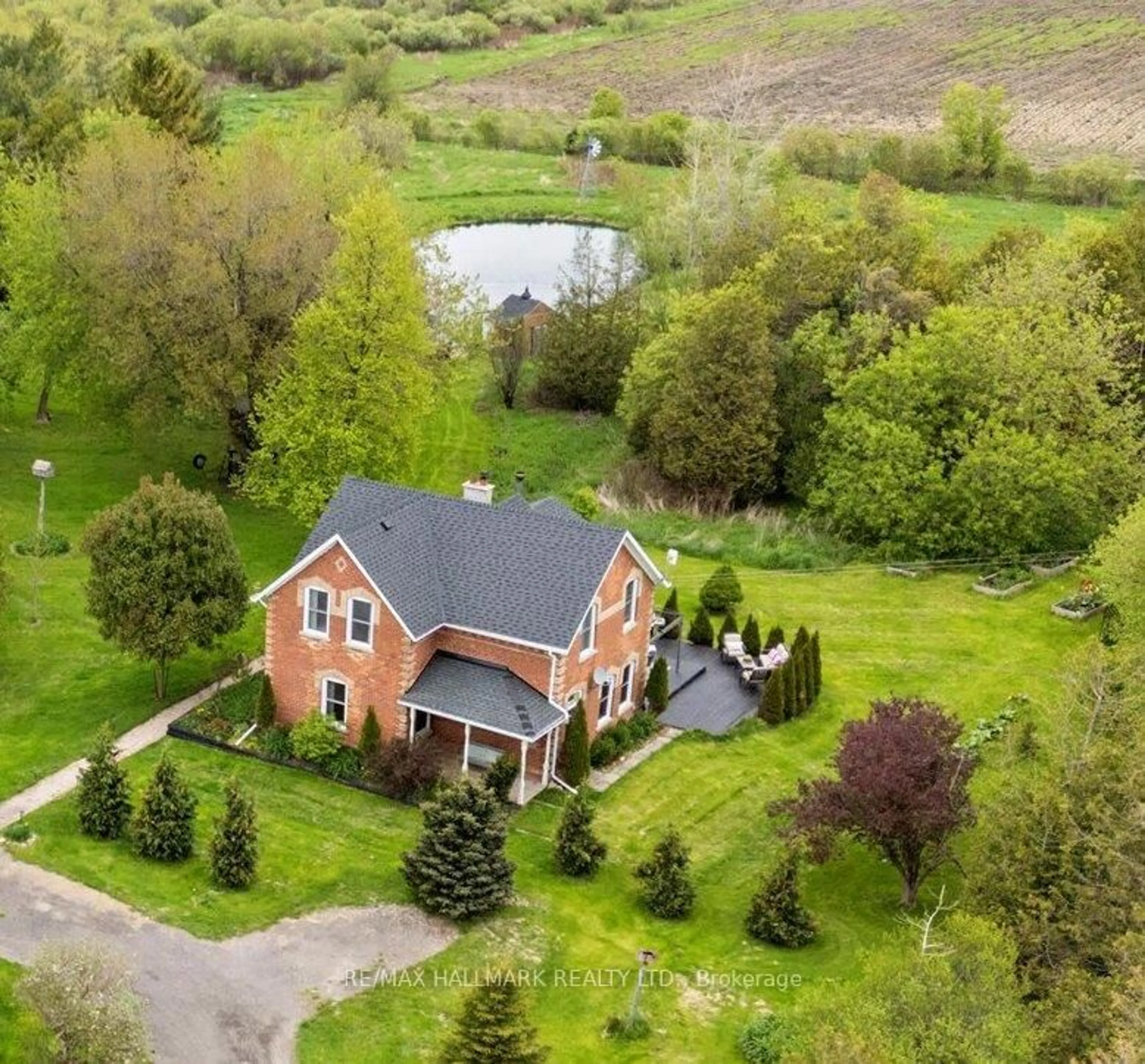 A pic from outside/outdoor area/front of a property/back of a property/a pic from drone, unknown for 473395 County Road 11, Amaranth Ontario L9W 0R3