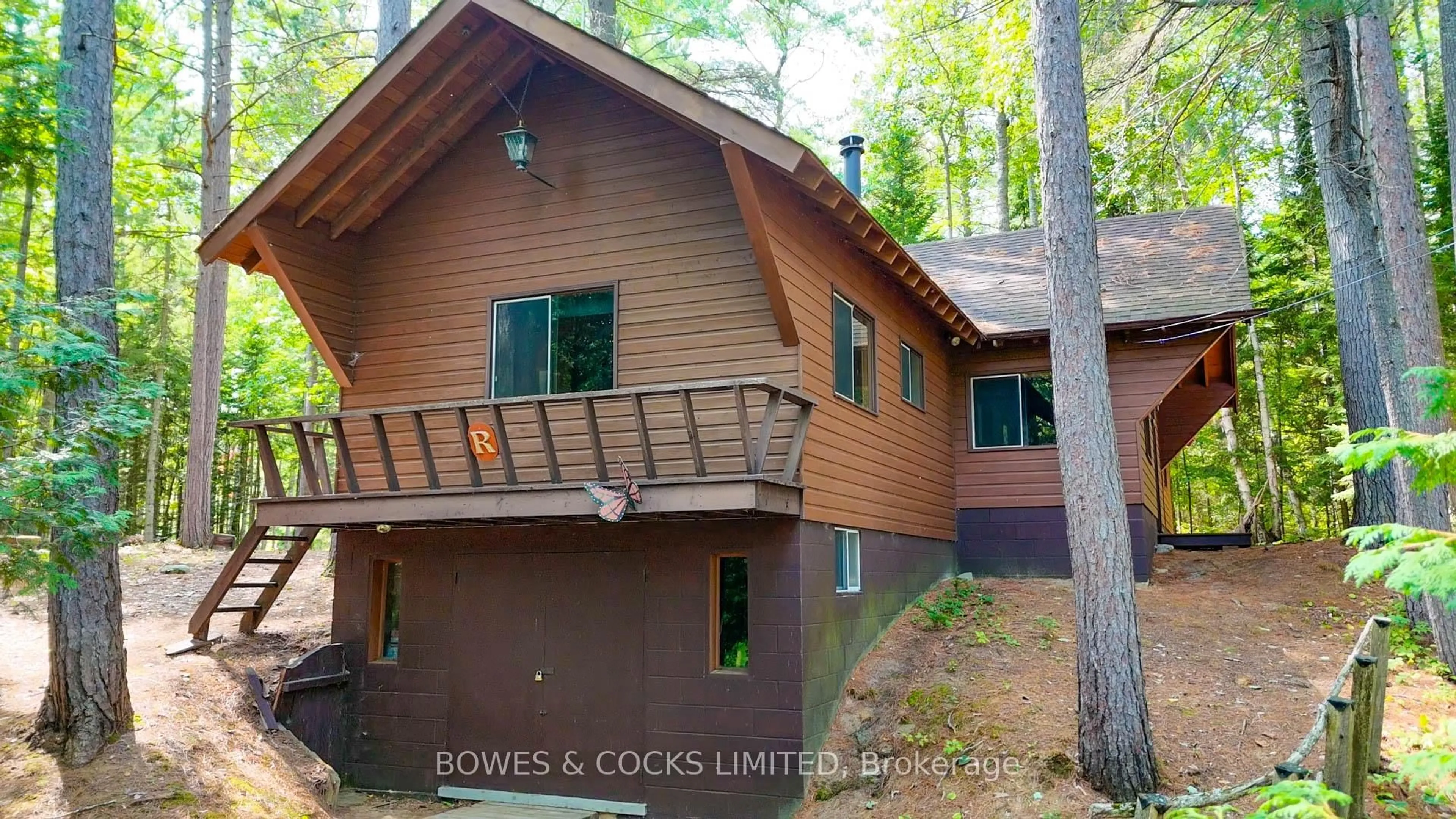 Home with vinyl exterior material, forest/trees view for 915 Madawaska River Dr, Combermere Ontario K0J 1L0