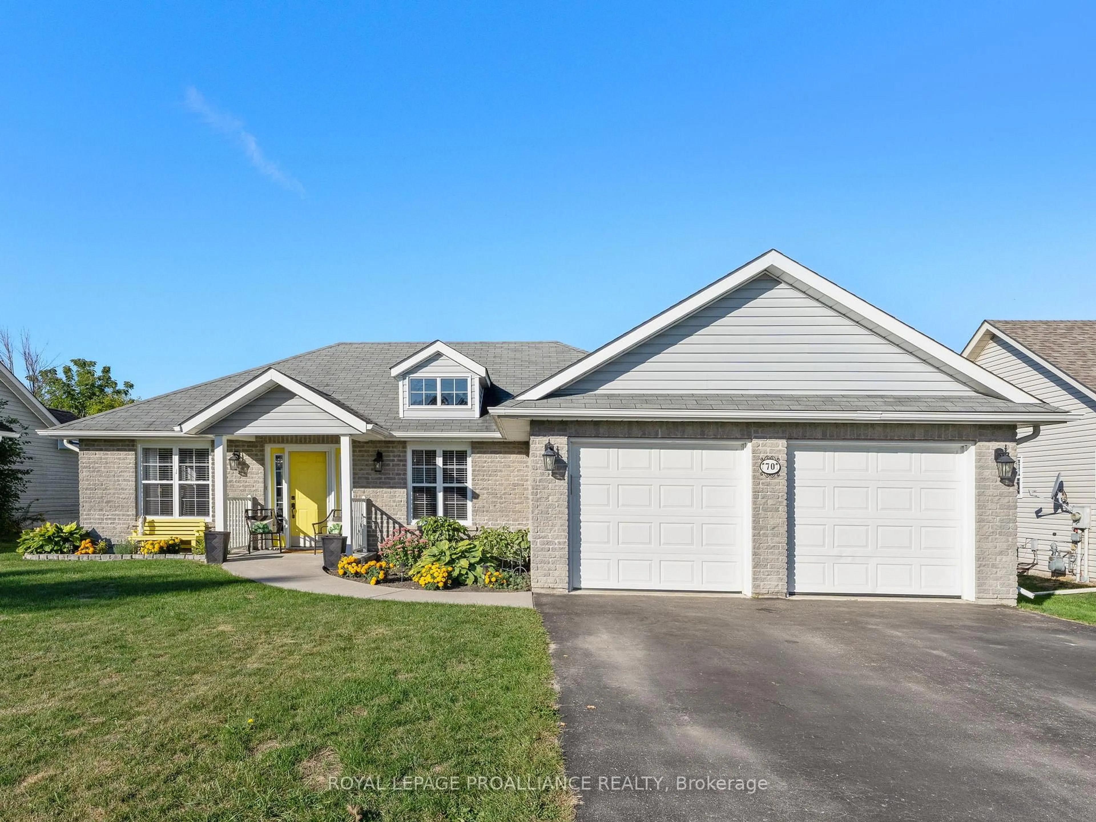 Home with vinyl exterior material, street for 70 Division St, Cramahe Ontario K0L 1Y0