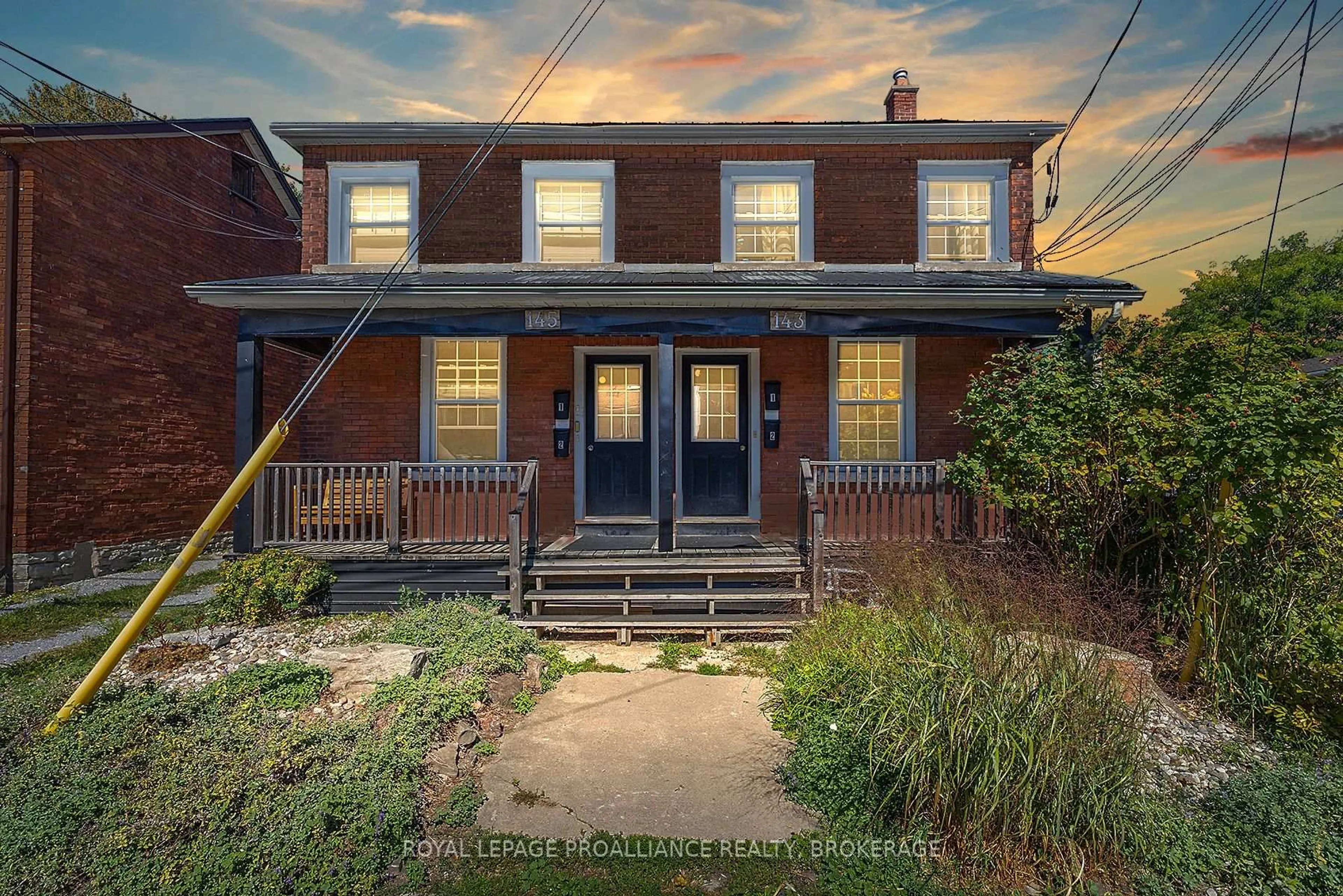 Home with brick exterior material, street for 143-145 Ordnance St, Kingston Ontario K7K 1G9