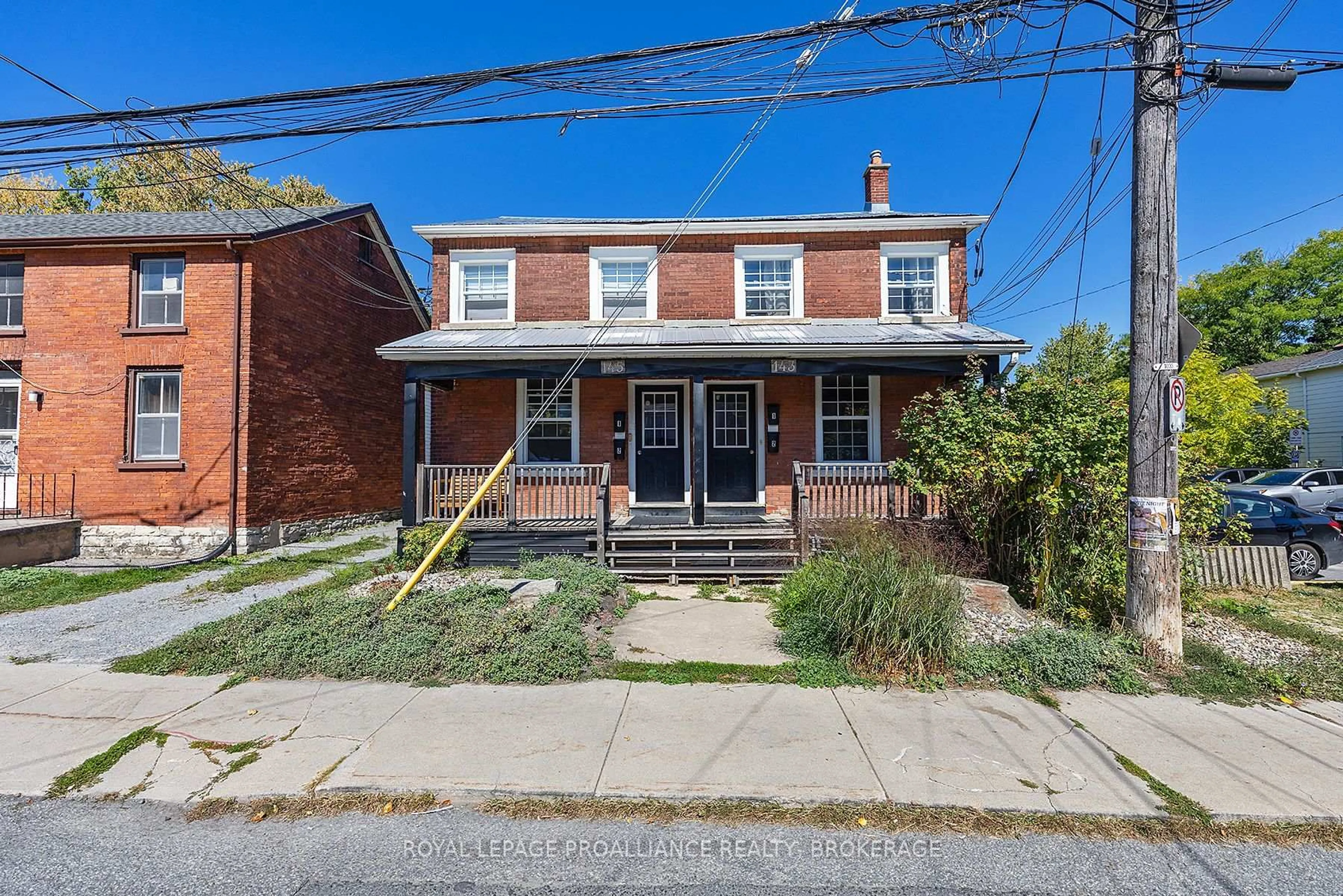 Home with brick exterior material, street for 143-145 Ordnance St, Kingston Ontario K7K 1G9